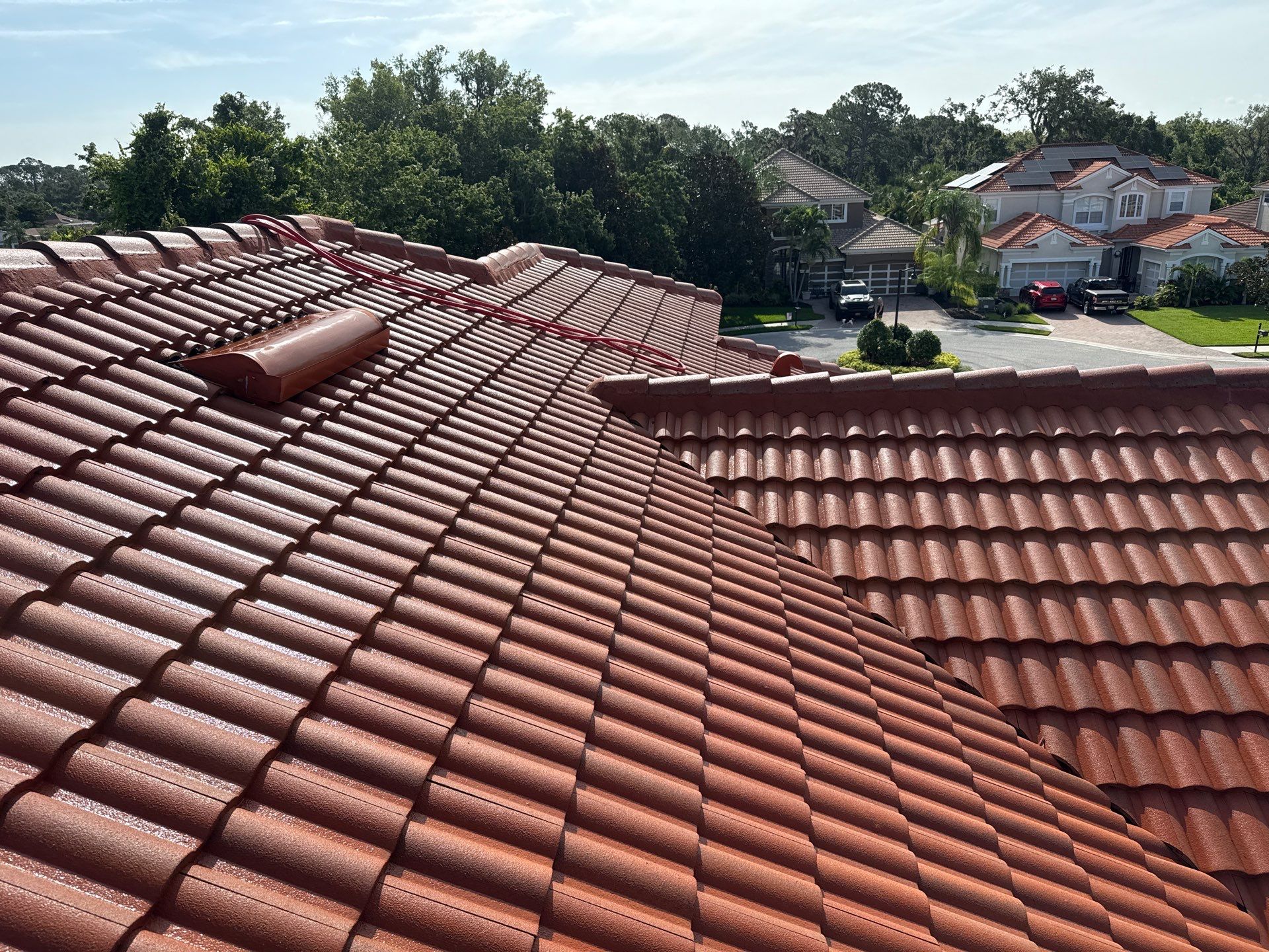 Soft Wash Tile Roof Cleaning in Sonoma Community, Sarasota, FL by Sunshine AquaWash