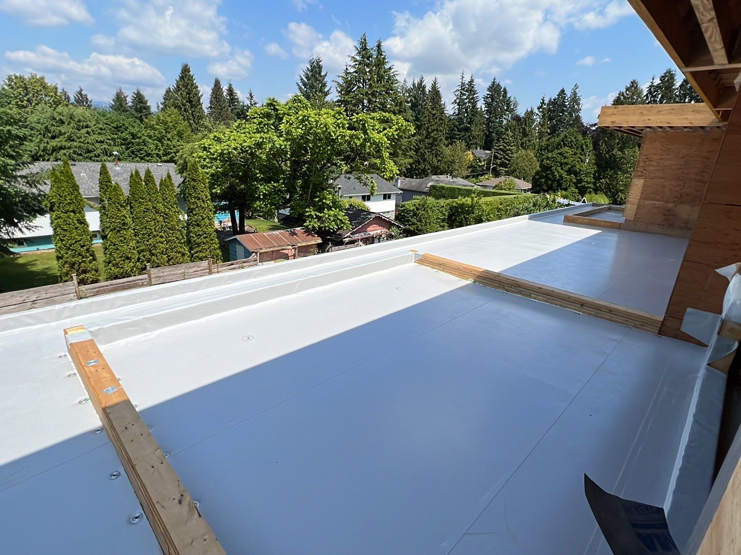 Residential Roofing Installation using Durolast roofing membrane by Top Notch Roofing Inc