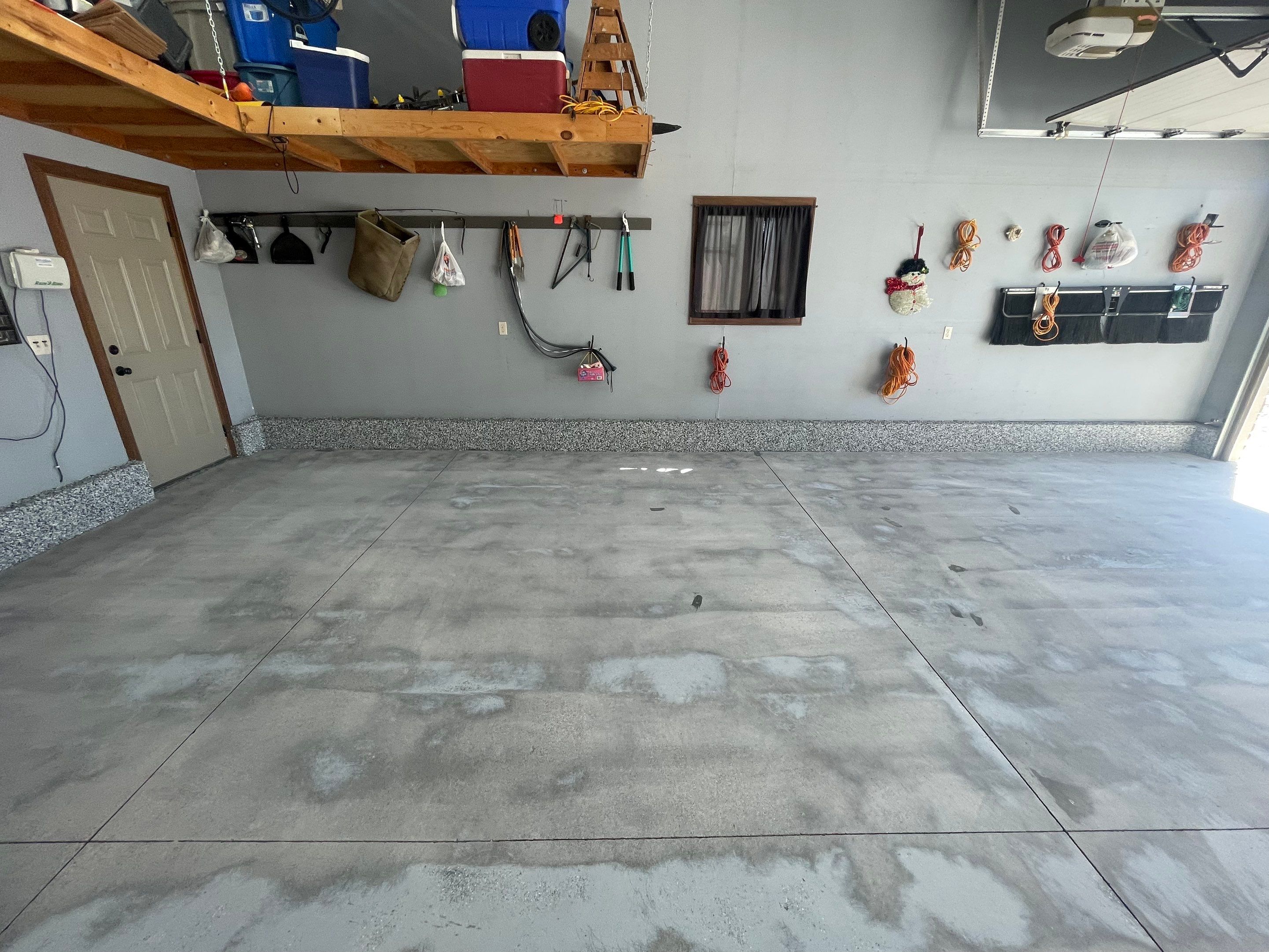 Residential Garage Floor Coating in Sioux Falls by Select Painting, Coatings & Garage Cabinets