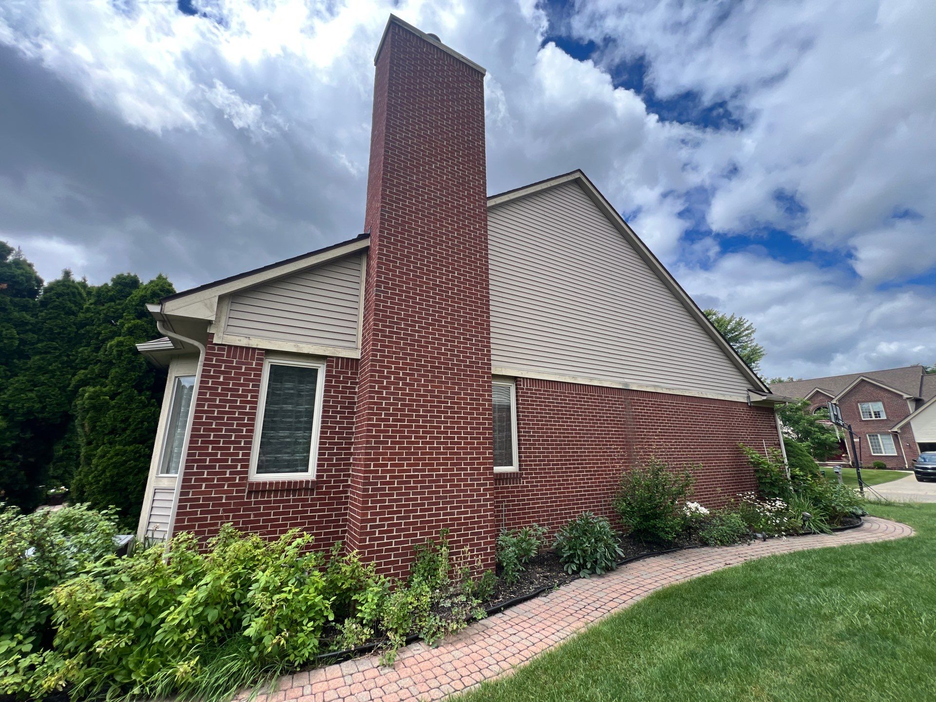 Vinyl Siding and Exterior Trim Painting in Commerce Township by Top Shelf Painter