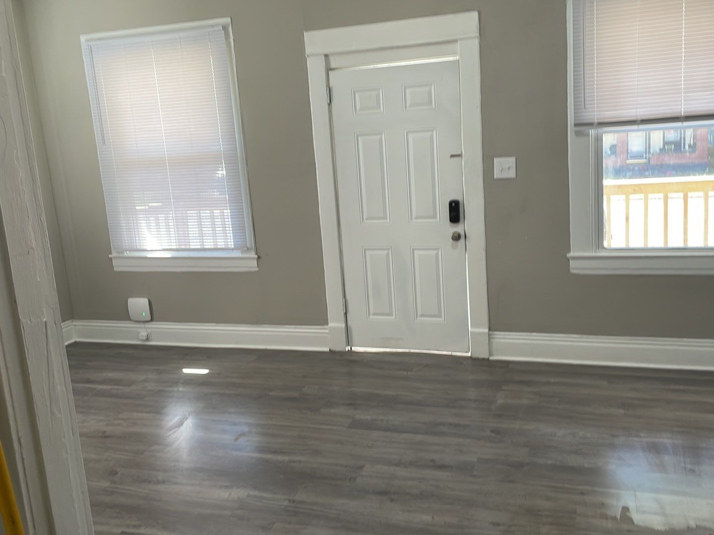 Rental Property Restoration, siding, flooring, gutters, landscaping by Storm Contracting 