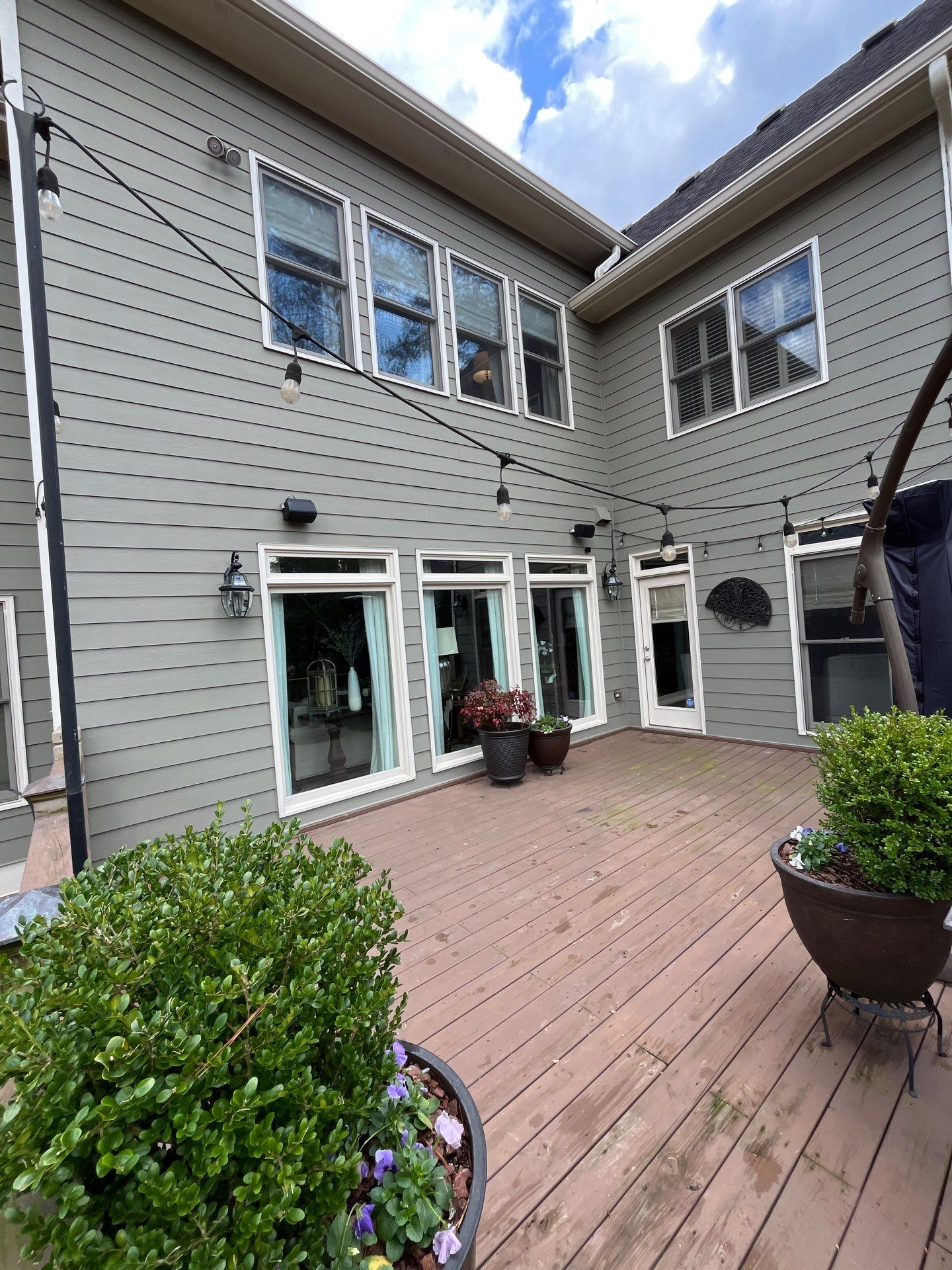 Tucker, GA Covered Porch Build and Deck Replacement using Deckorators Voyage Series Decking by Nelson Exteriors 
