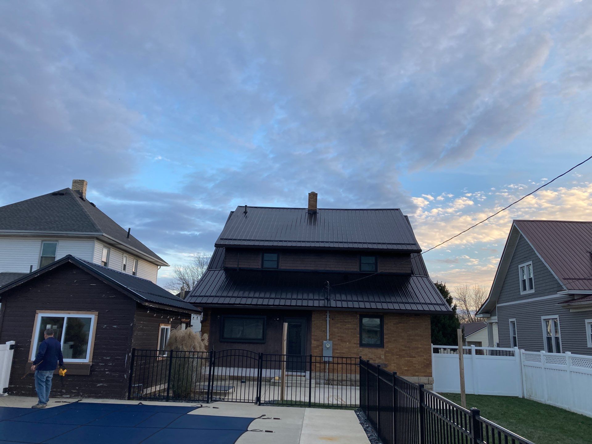 Residential Roofing Installation using Perfromance Panel Metal - Black by RoofX 