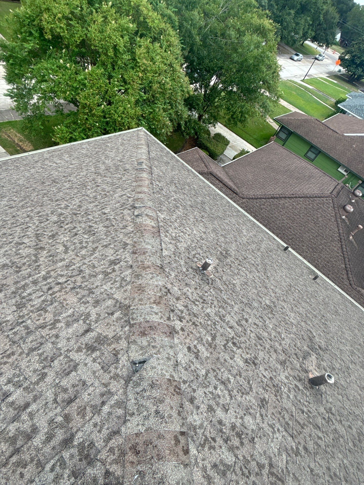 Hail Damage using Owen's Corning Duration (Lifetime) Shingles by Roof Repair Company