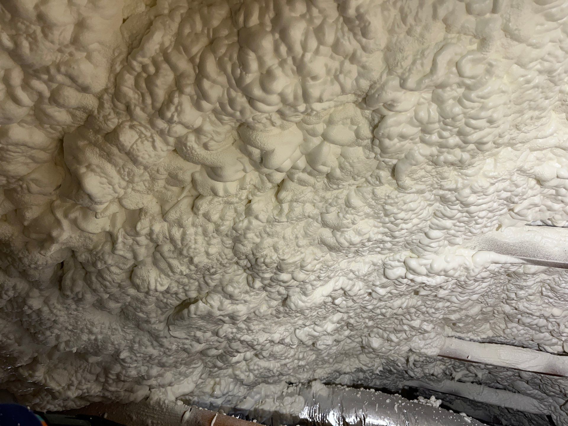 Basement Exterior Walls using Closed Cell Spray Foam by NYS Foam & Energy