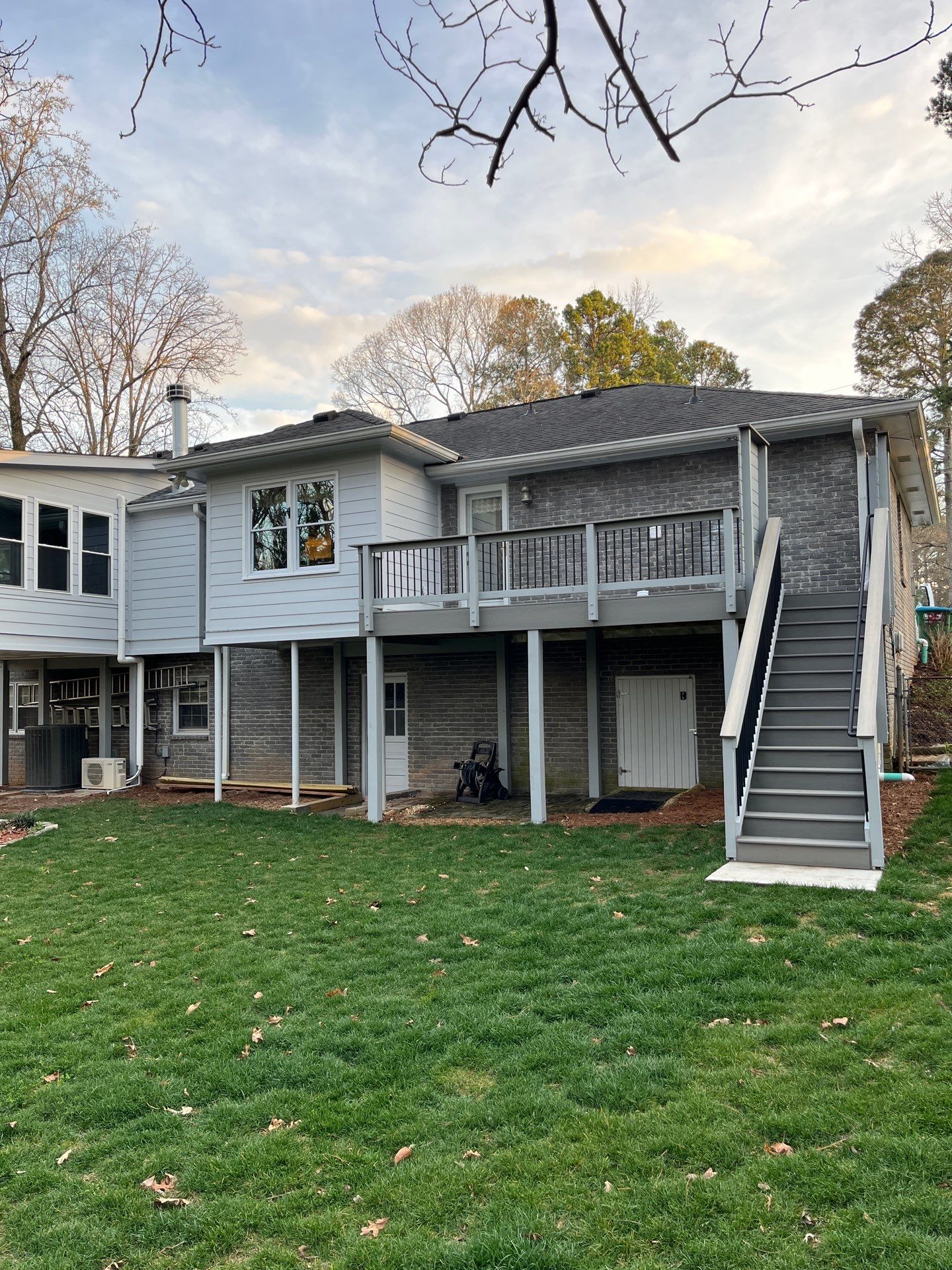 James Hardie Siding Replacement, Trex Railing Install, Exterior Painting, and Staining in Stone Mountain, GA by Nelson Exteriors
