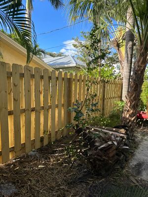 Wood Fence Installation using Wood Vertical Shadow Box