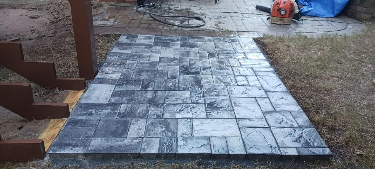 Fuquay-Varina Outdoor Upgrade – Composite Deck & Paved Landing by Elite Remodeling and Design LLC