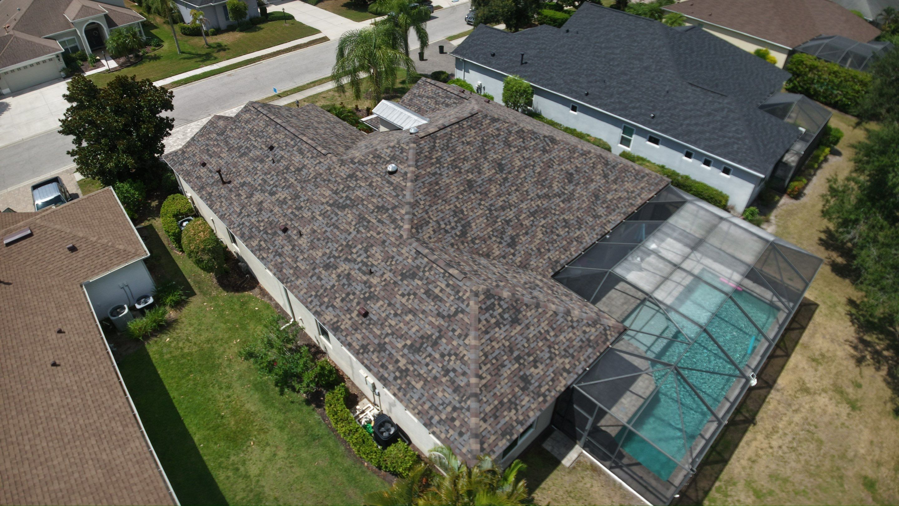 Architectural Summer Harvest Asphalt Shingle Roof Replacement in Bradenton, Florida by Trinity Restoration and Roofing LLC
