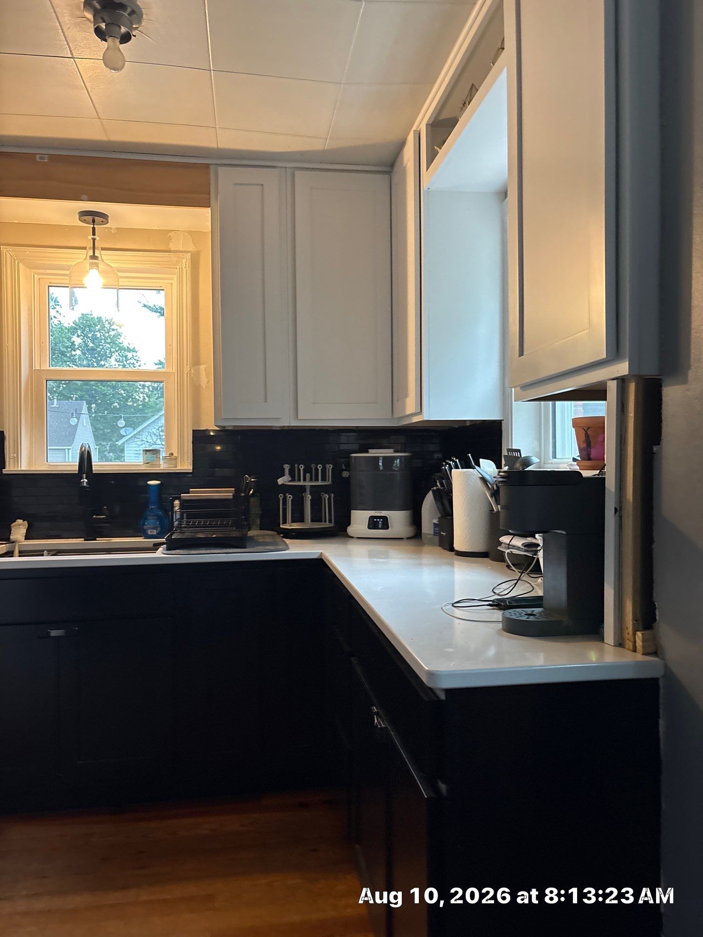 Modern Kitchen Renovation with Black and White Cabinetry in Lincoln by CompanyCam Sales Demo