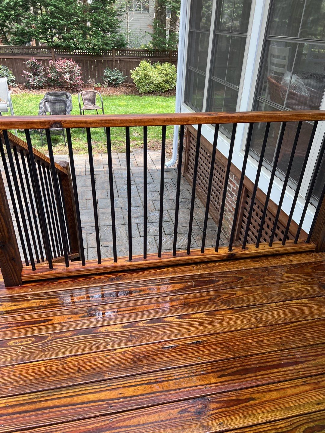 Deck and Stamped Concrete Patio by DuraSeal