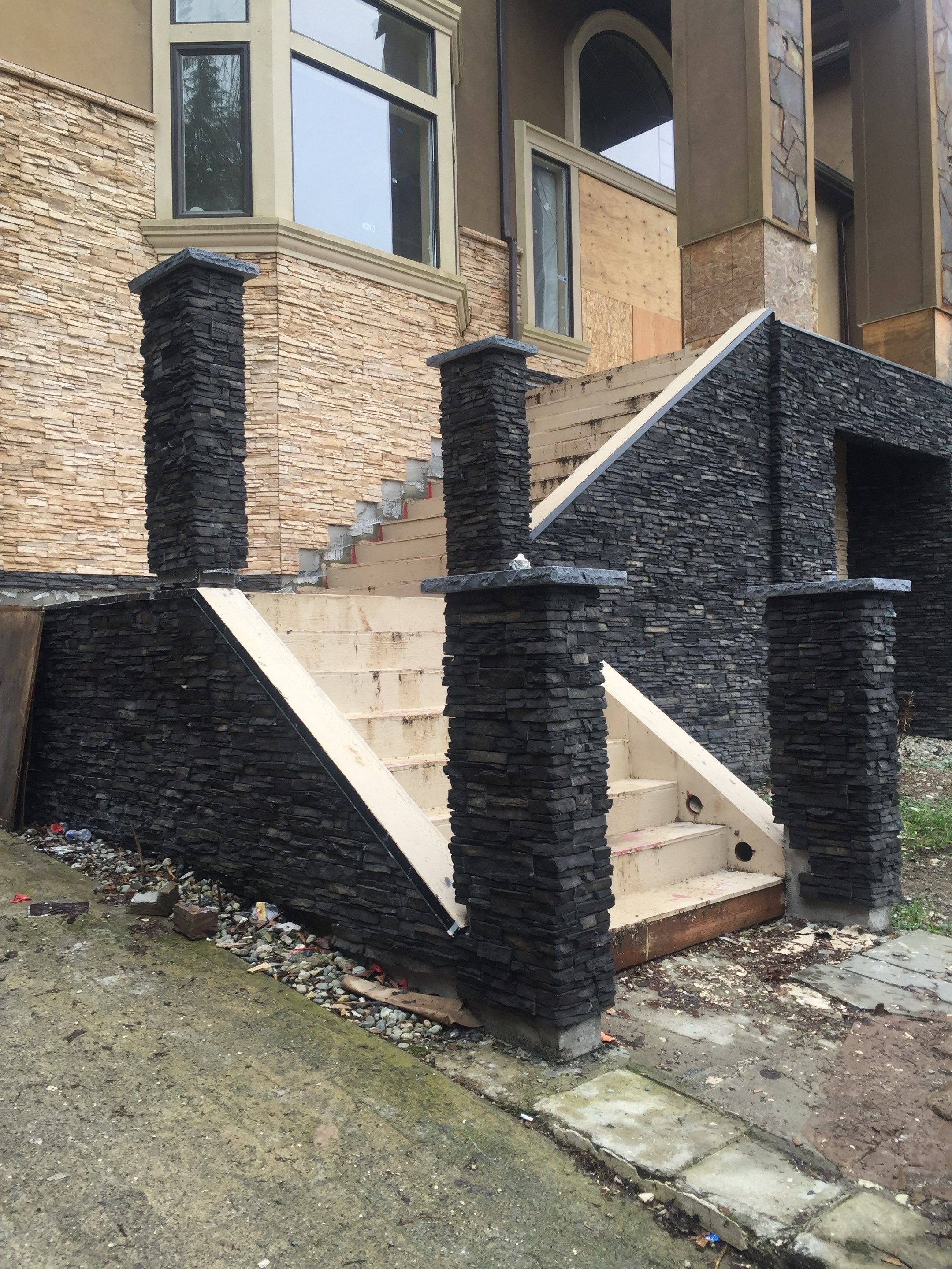 Asphalt Driveway and Stamped Concrete Patio Finish  by Jireh Asphalt & Concrete Inc 