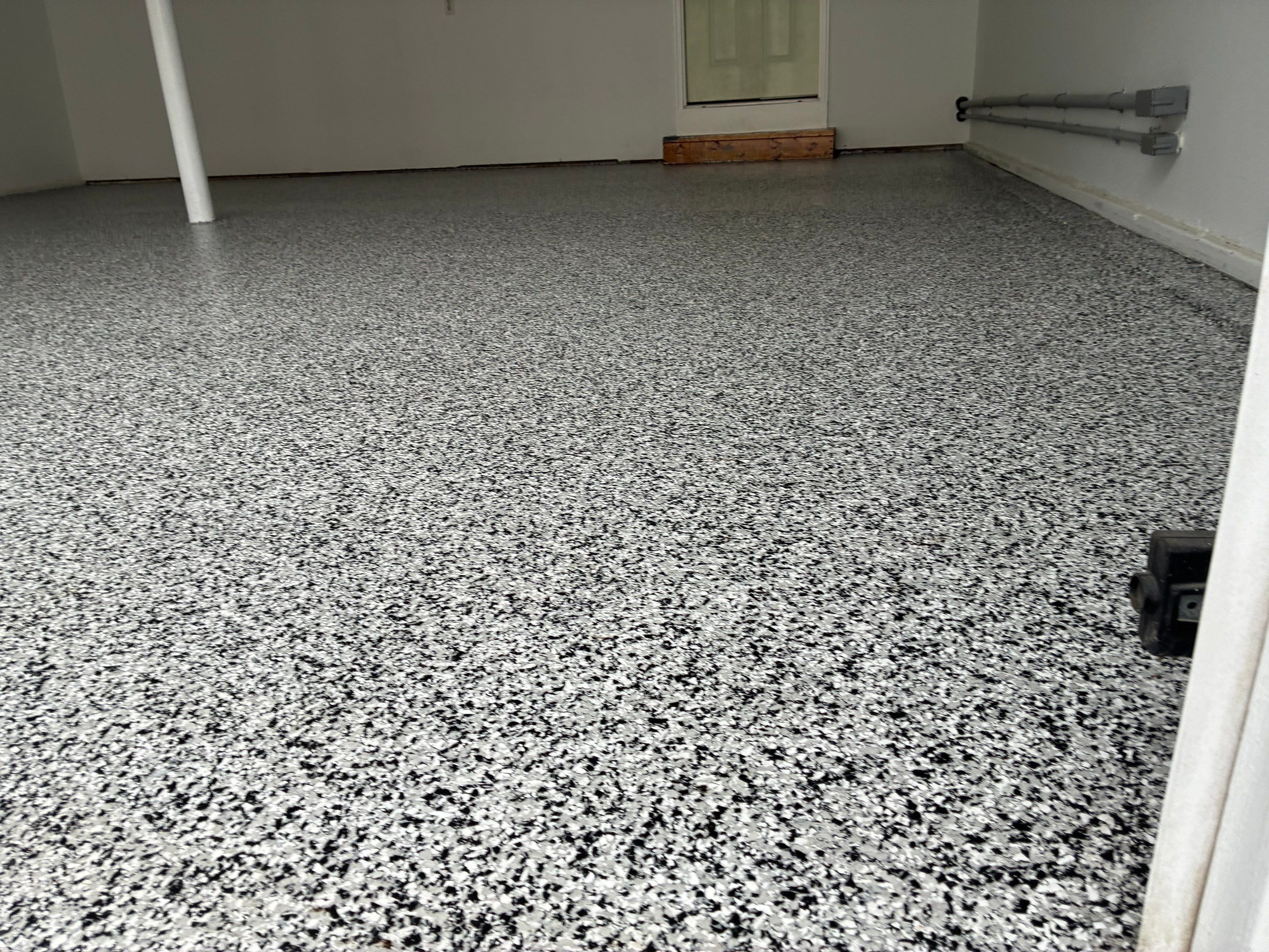 Beautiful Concrete Floor Coating in Domino by DiGiorgi Roofing and Siding Inc