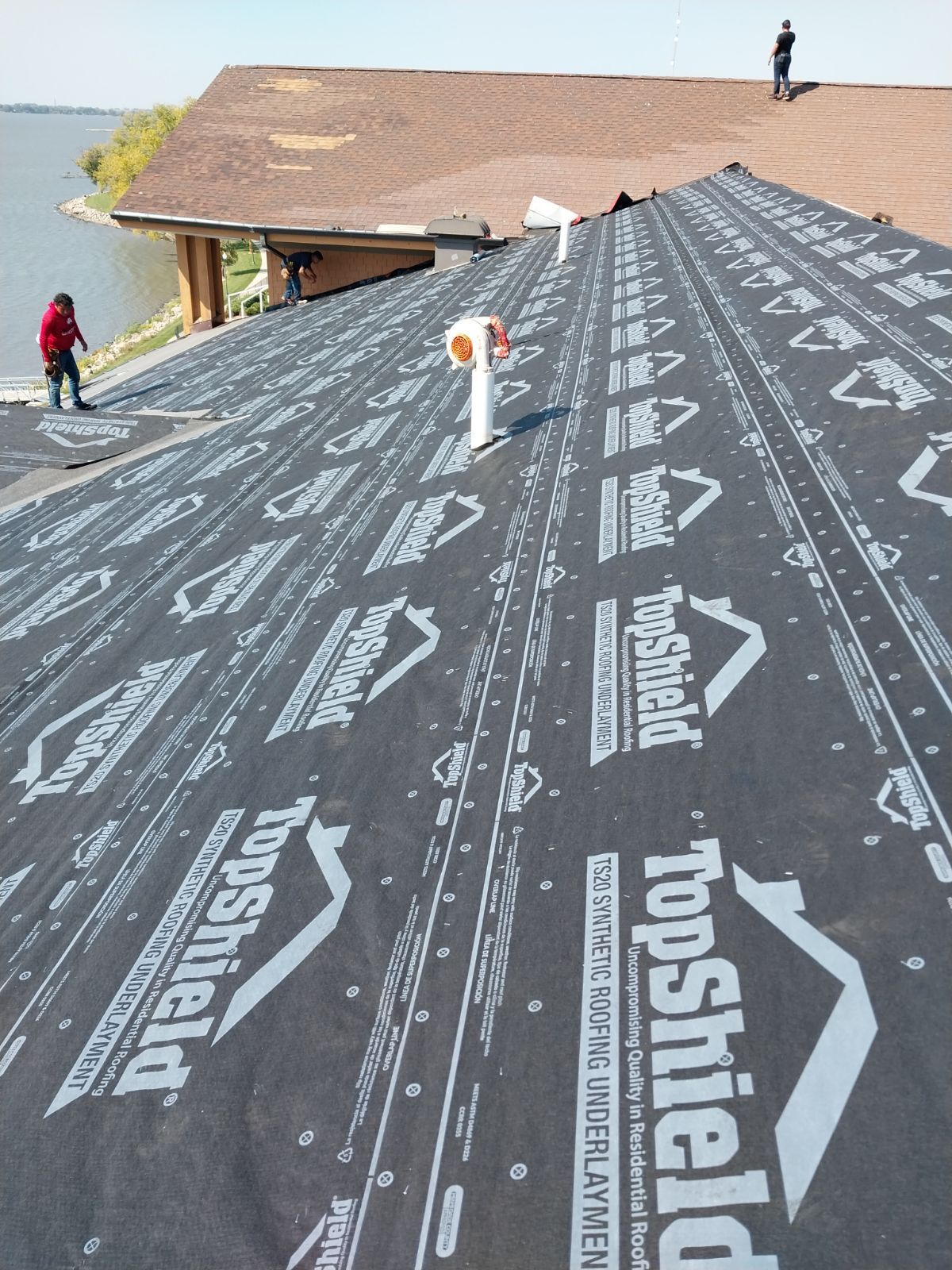 Commercial Roofing Installation using Shingles by Grell Roofing, LLC