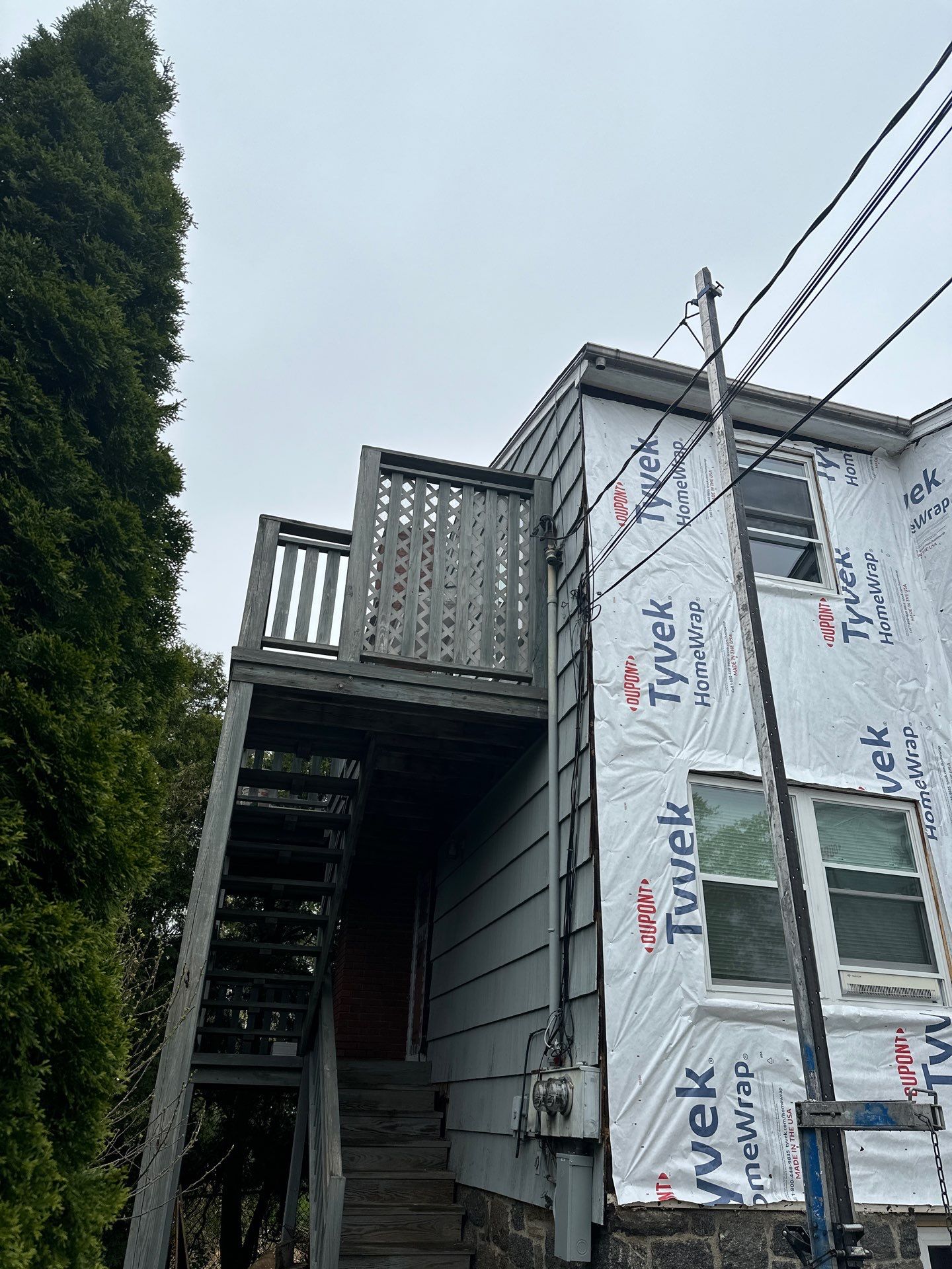 Siding Installation using Certainteed Cedar Impressions Straight Edge Perfection Shingles - D7 - Sterling Gray by A Plus Exterior
