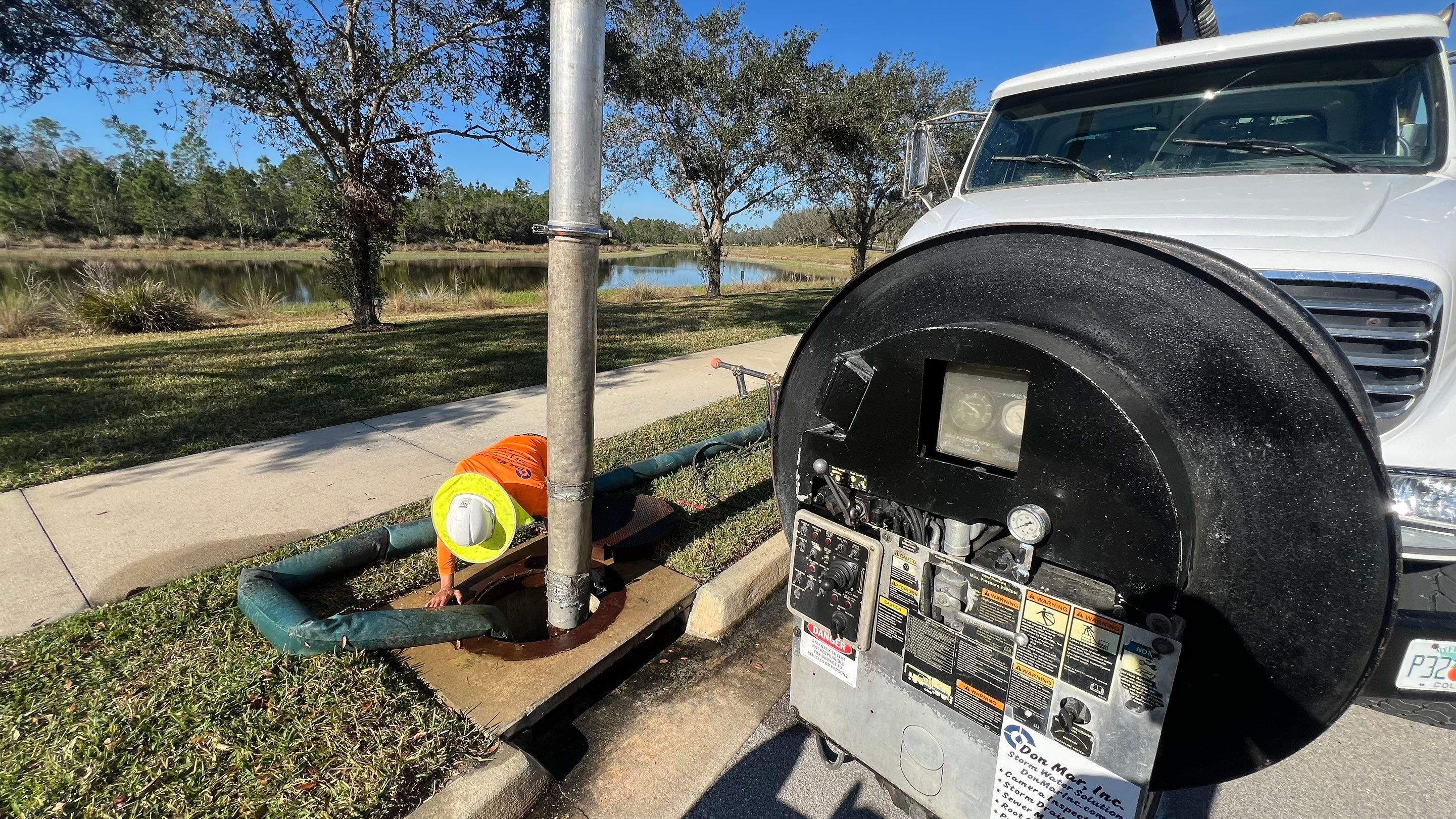 Naples Association Catch Basin Cleaning using Vactor Truck by Don Mar, Inc. Storm Water Solutions