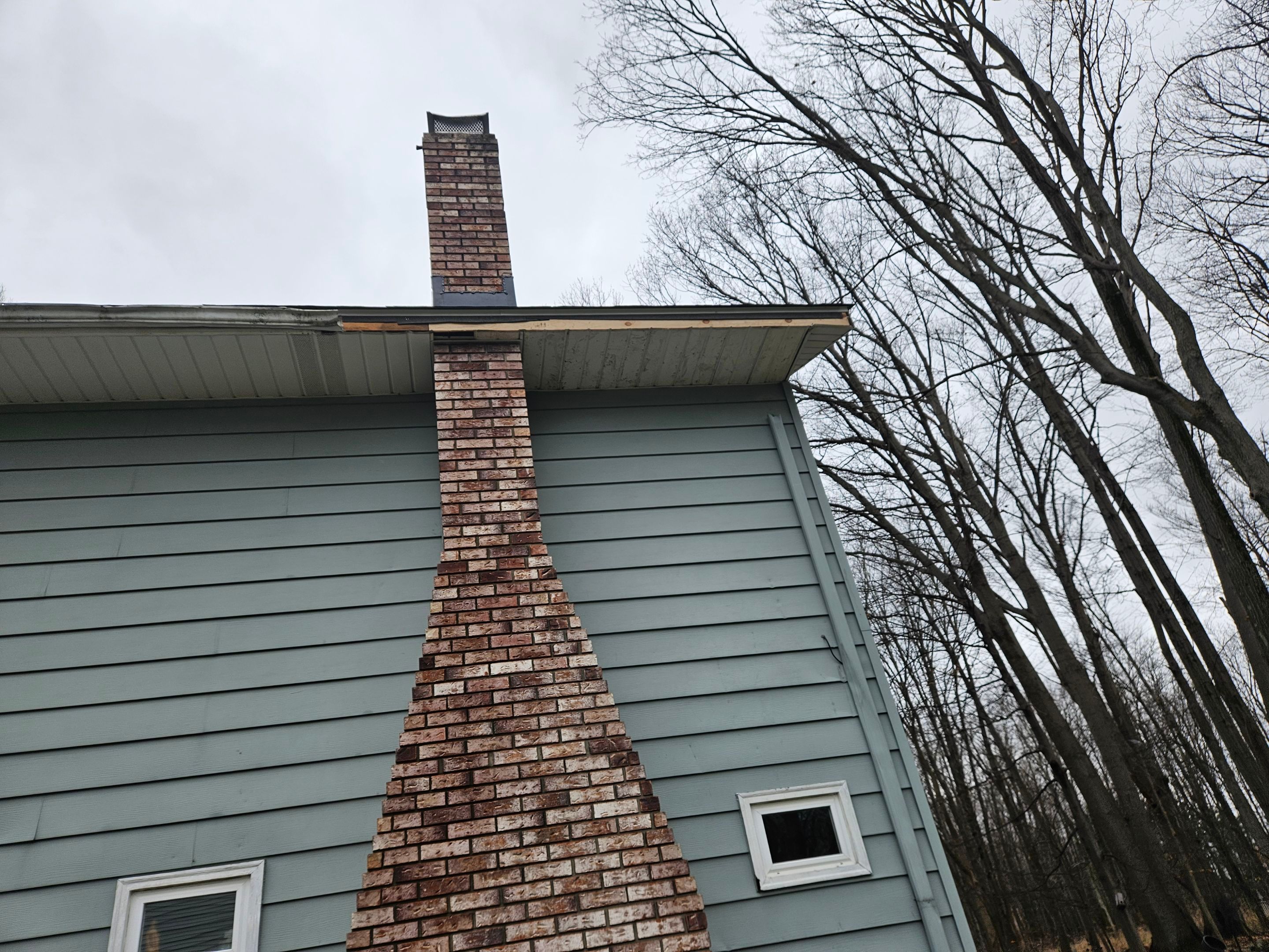 Residential Roof Replacement using Owens Corning Onyx Black by Absolute Roofing and Construction
