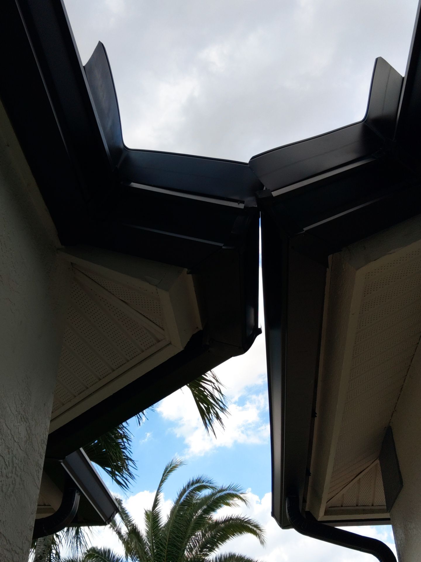 Black Seamless Gutters  by Gutter Professors