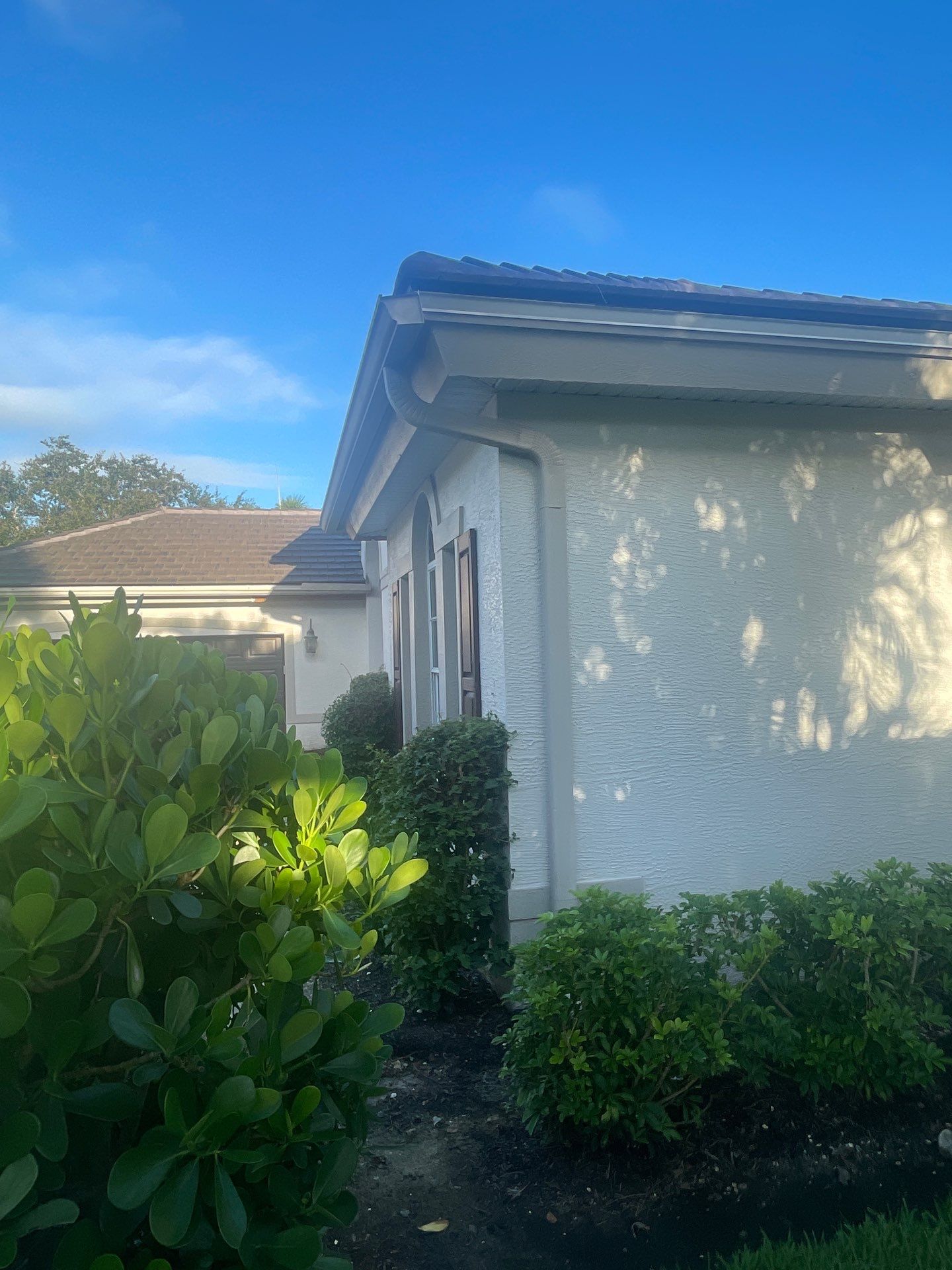 6-inch K-style Gutters with New Splash Guard in Bonita Spring FL by Gutter Professors