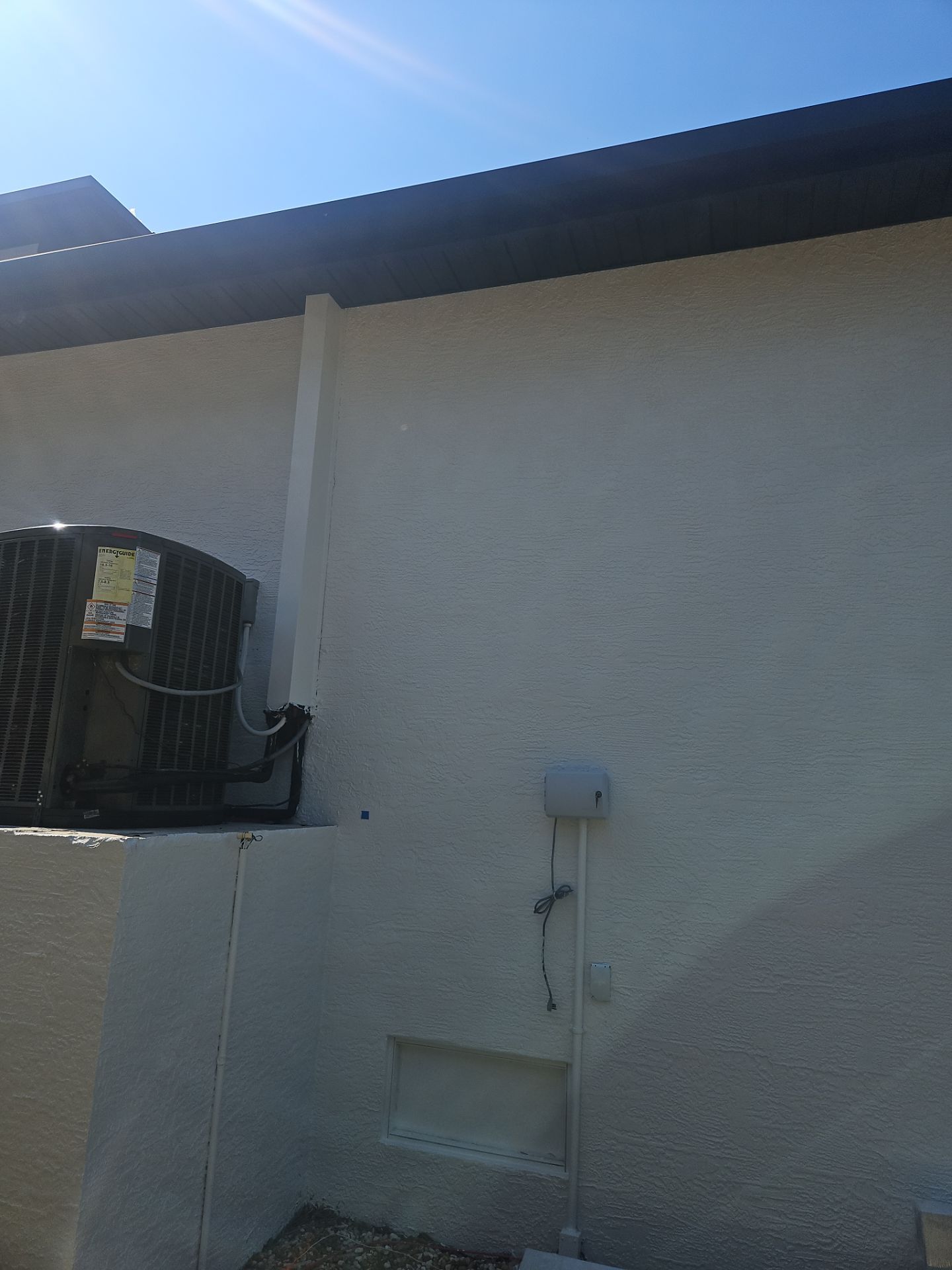 Soffit and Fascia Installation and black seamless gutters in Sarasota FL by Gutter Professors