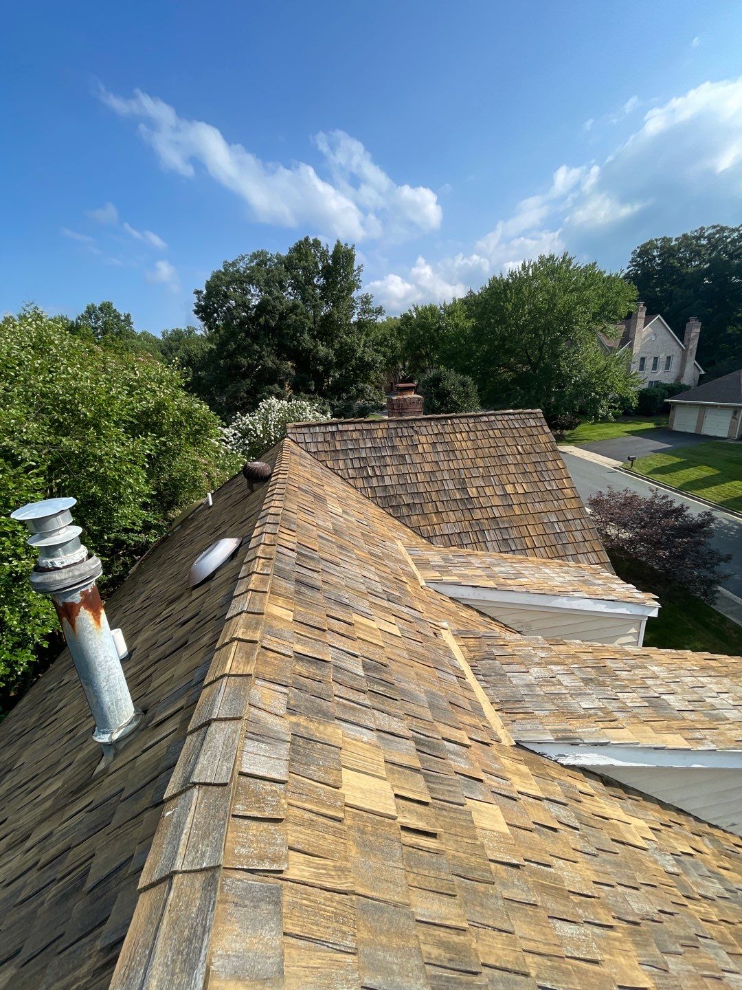 Sleek Tesla Solar Roof Installation by American Home Contractors