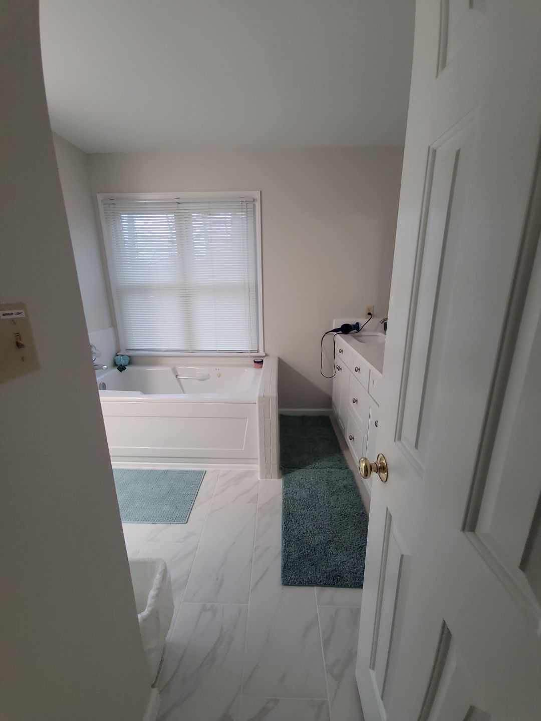 From Cramped & Carpeted to Bright & Modern: A Cary Bathroom Transformation by Elite Remodeling and Design LLC