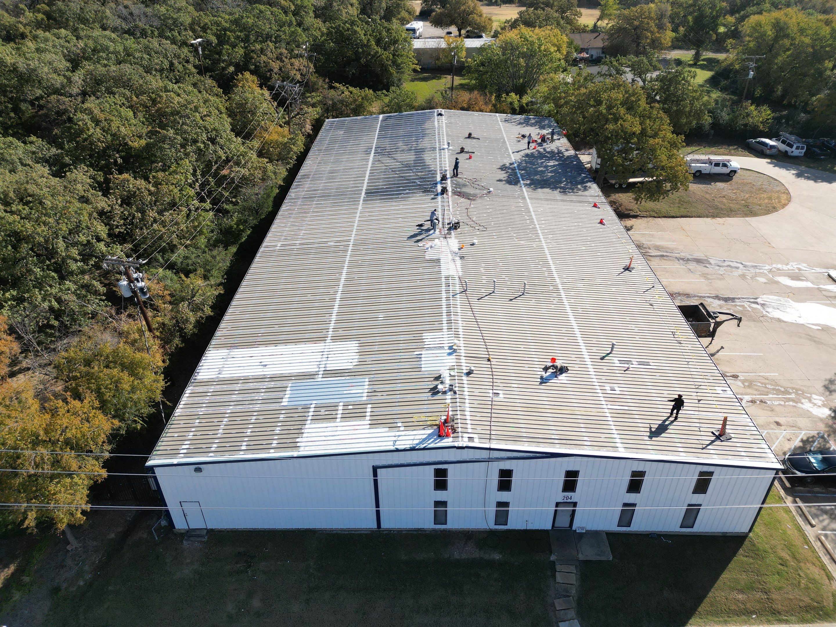 Silicone Coating Metal Rehab by First Out Roofing 