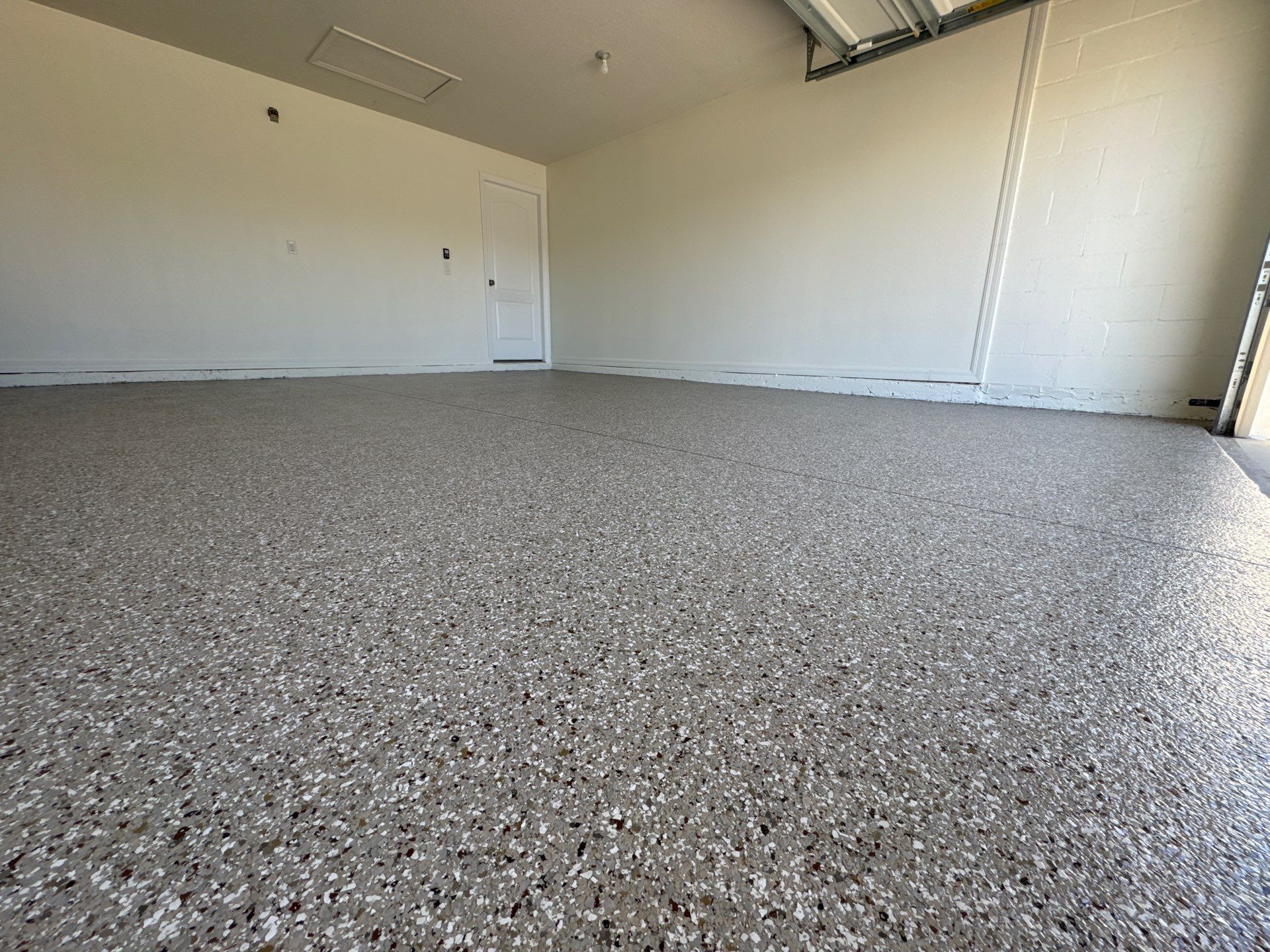 Clean & Practical 'Creekbed' Flake Finish by Performance Floors & Coating