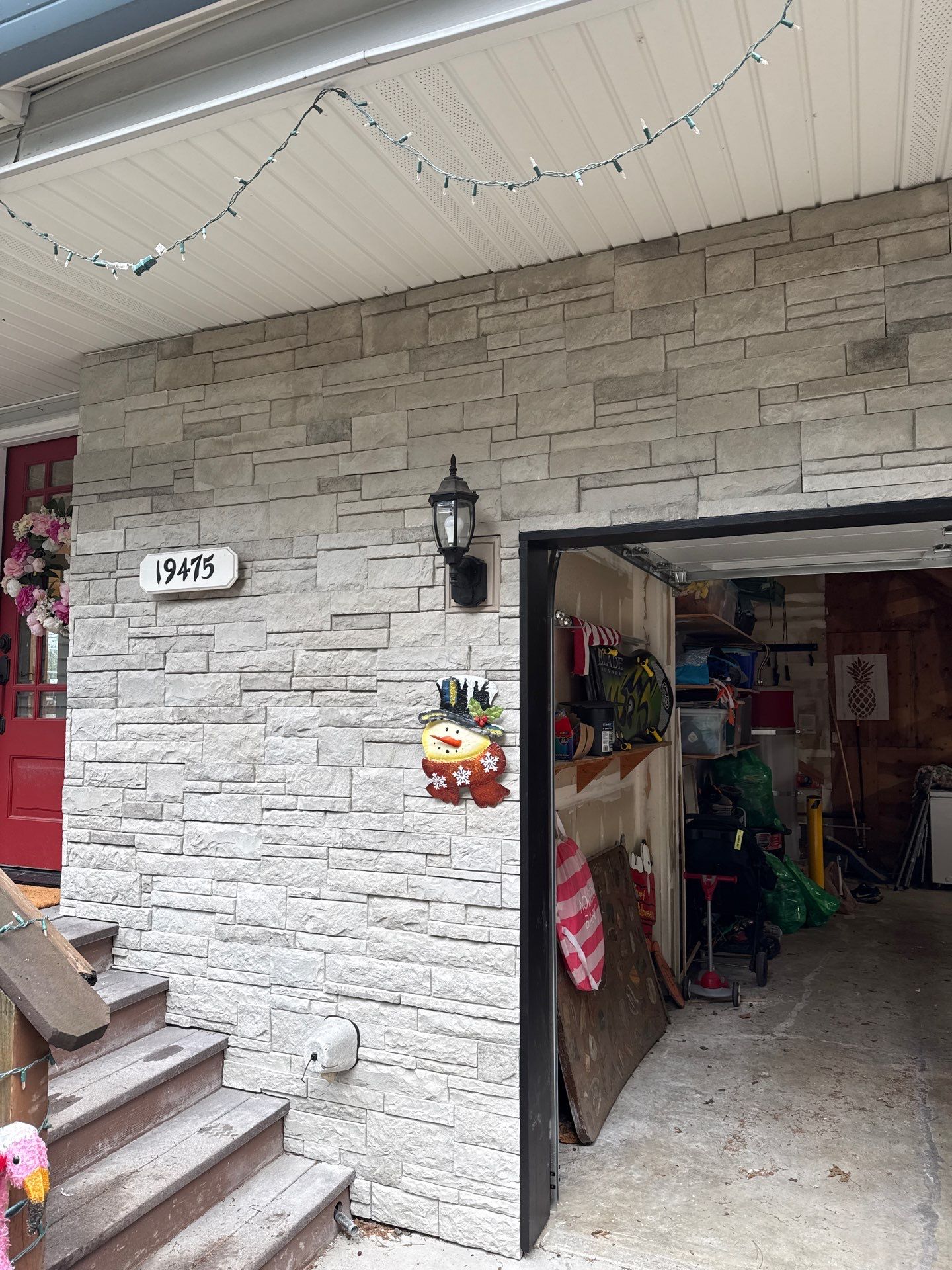 Damascus Garage Exterior Repair and Stacked Stone Veneer Installation by American Made Construction 