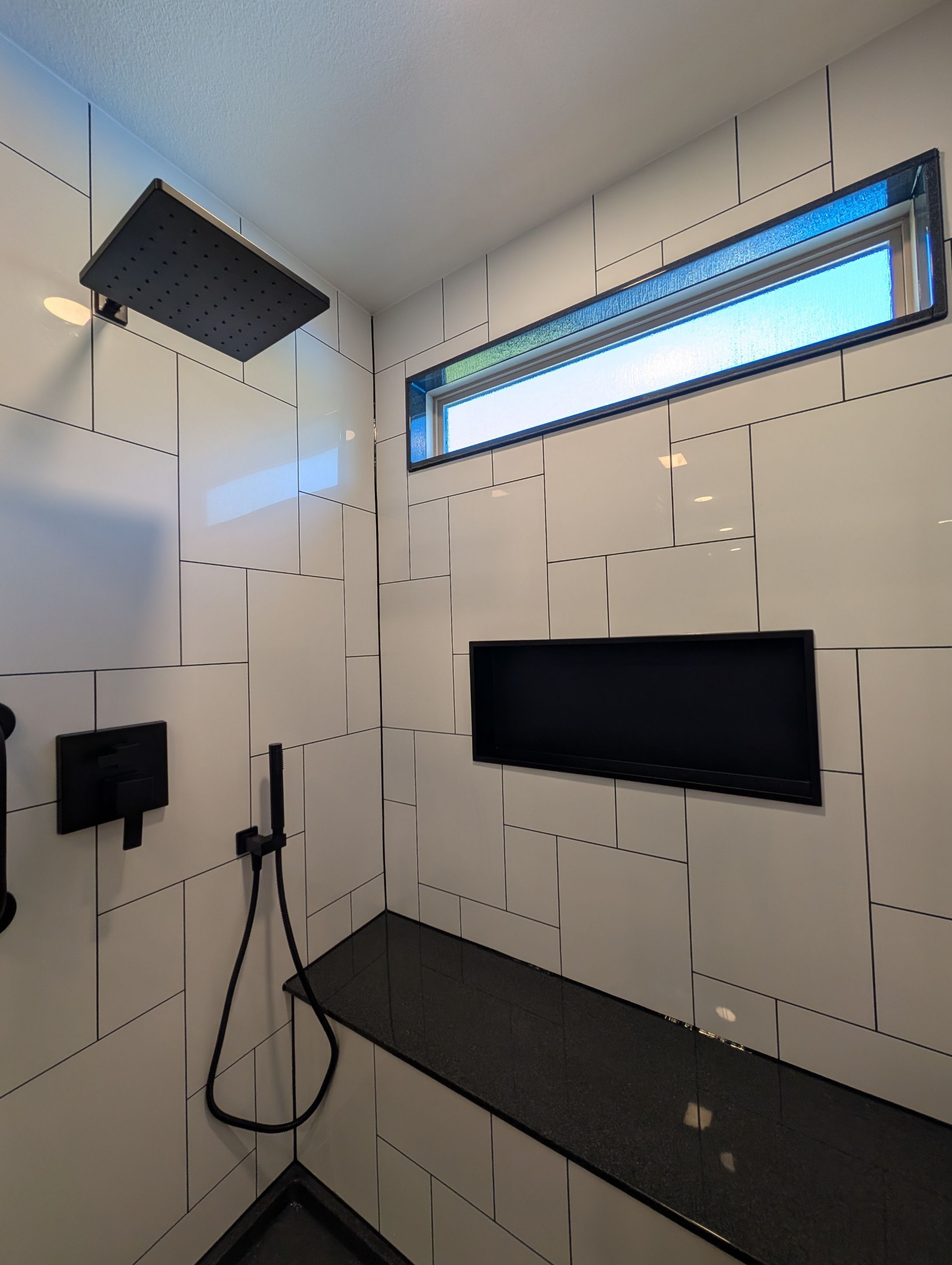 Universal City Tub-to-Shower Conversion with Built-In Bench and Backlit Mirror by Legacy Bath and Kitchen 