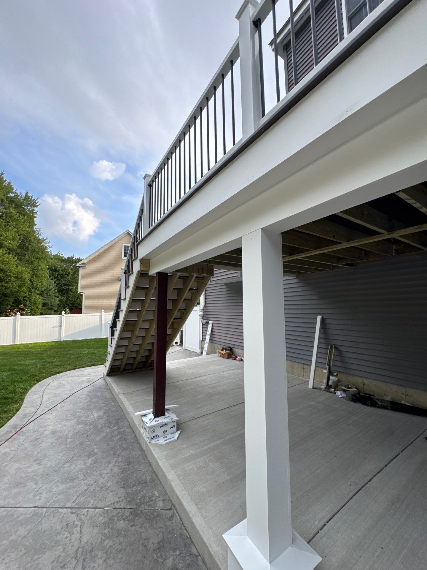 Roof, Trim, Deck, and Gutter Restoration by Mighty Dog Roofing of Greater Middlesex County