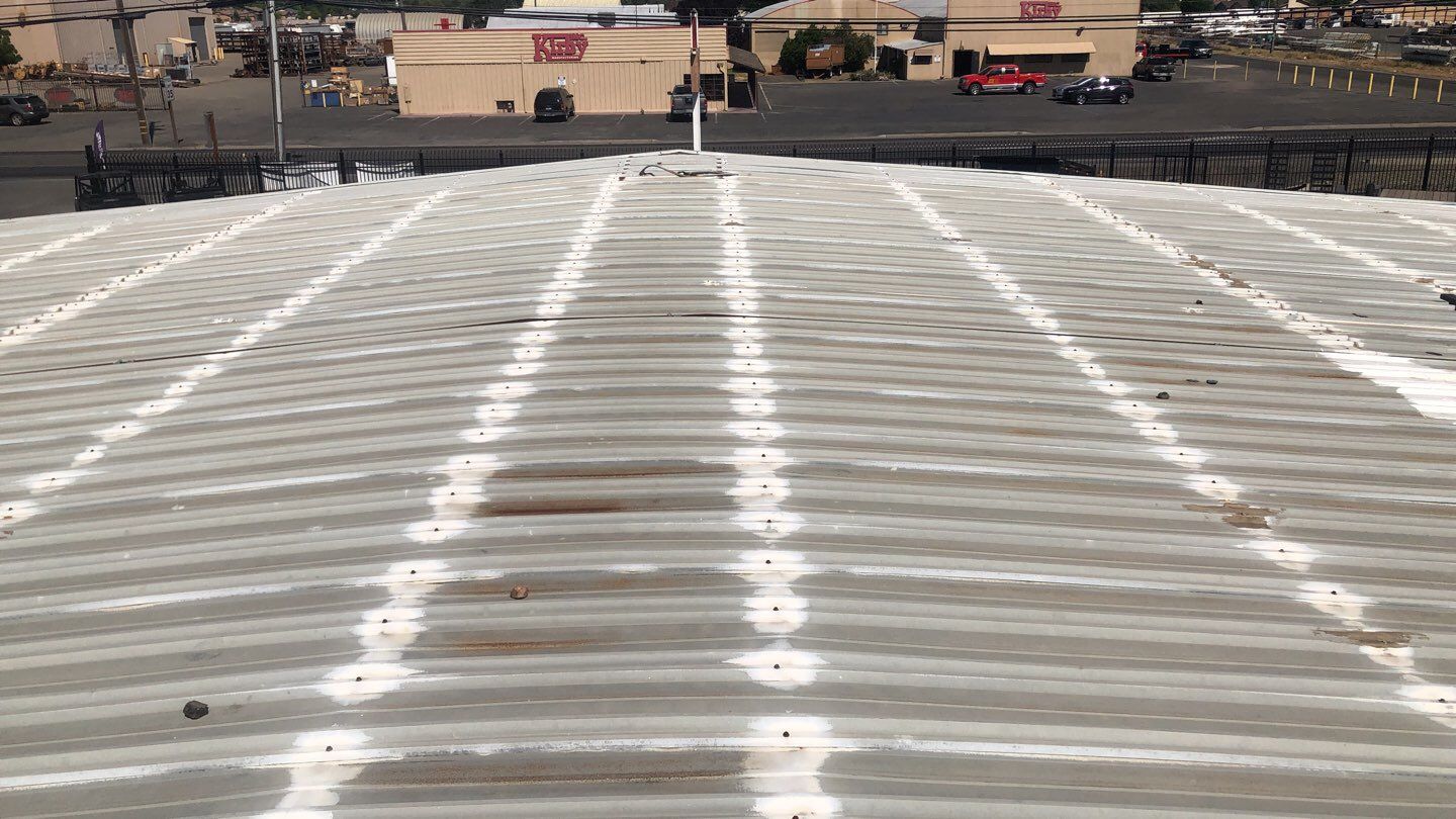 Metal Restoration Roofing system with Benchmark/PUMA XL 20 yr warranty by Straight Edge Roofing Inc