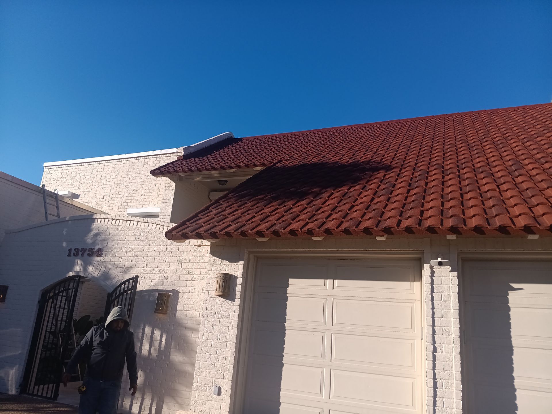 Off with the Tile and on with the TILCOR stone coated metal.  by Bayfront Roofing and Construction