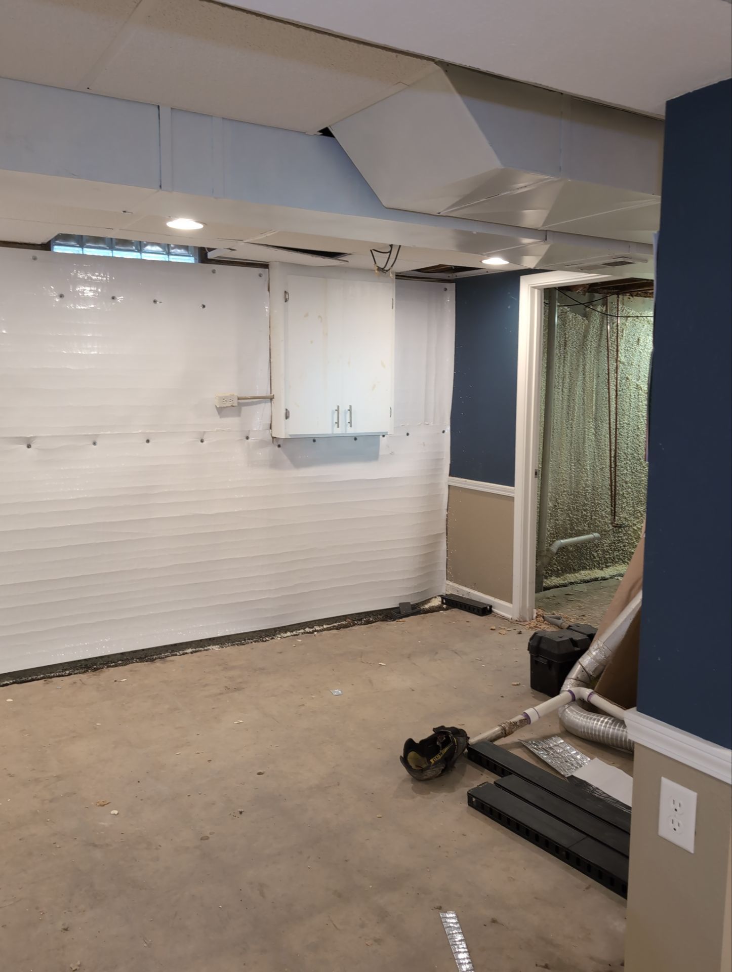 Interior Basement Waterproofing System and Egress Window Installation by Toledo Basement Repair 
