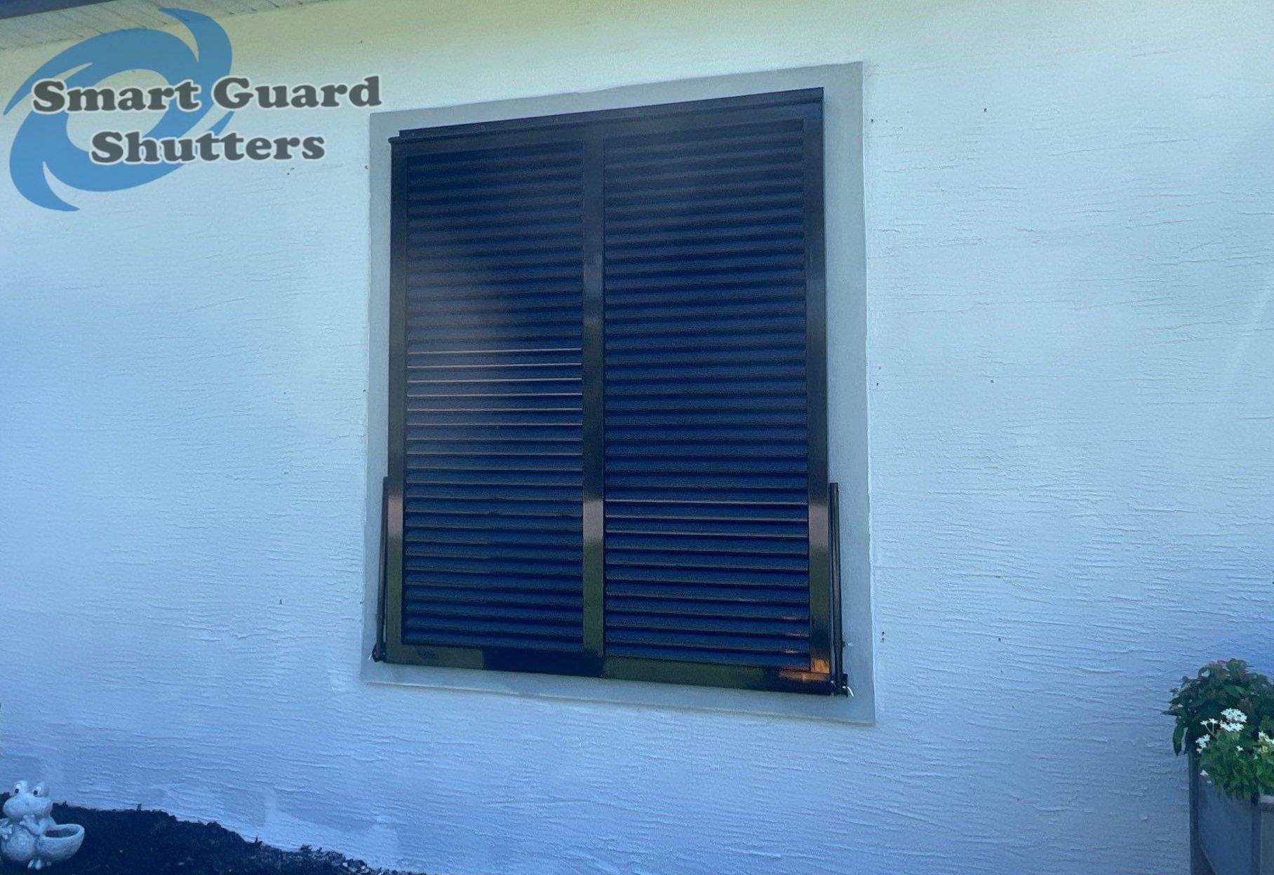 Impact Bahama Shutters in Jet Black by Smart Guard Shutters