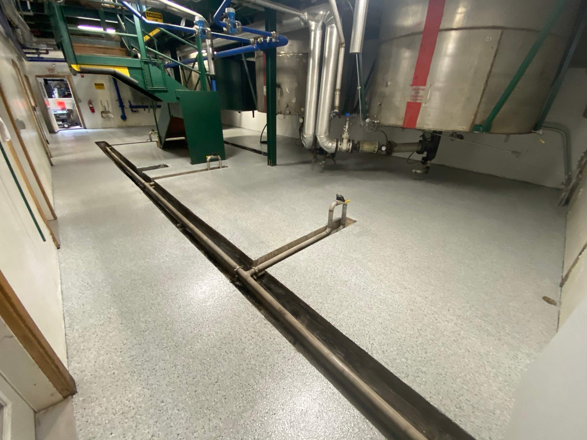 Commercial Floor Transformation using North Pole with Green by Croc Coatings, LLC