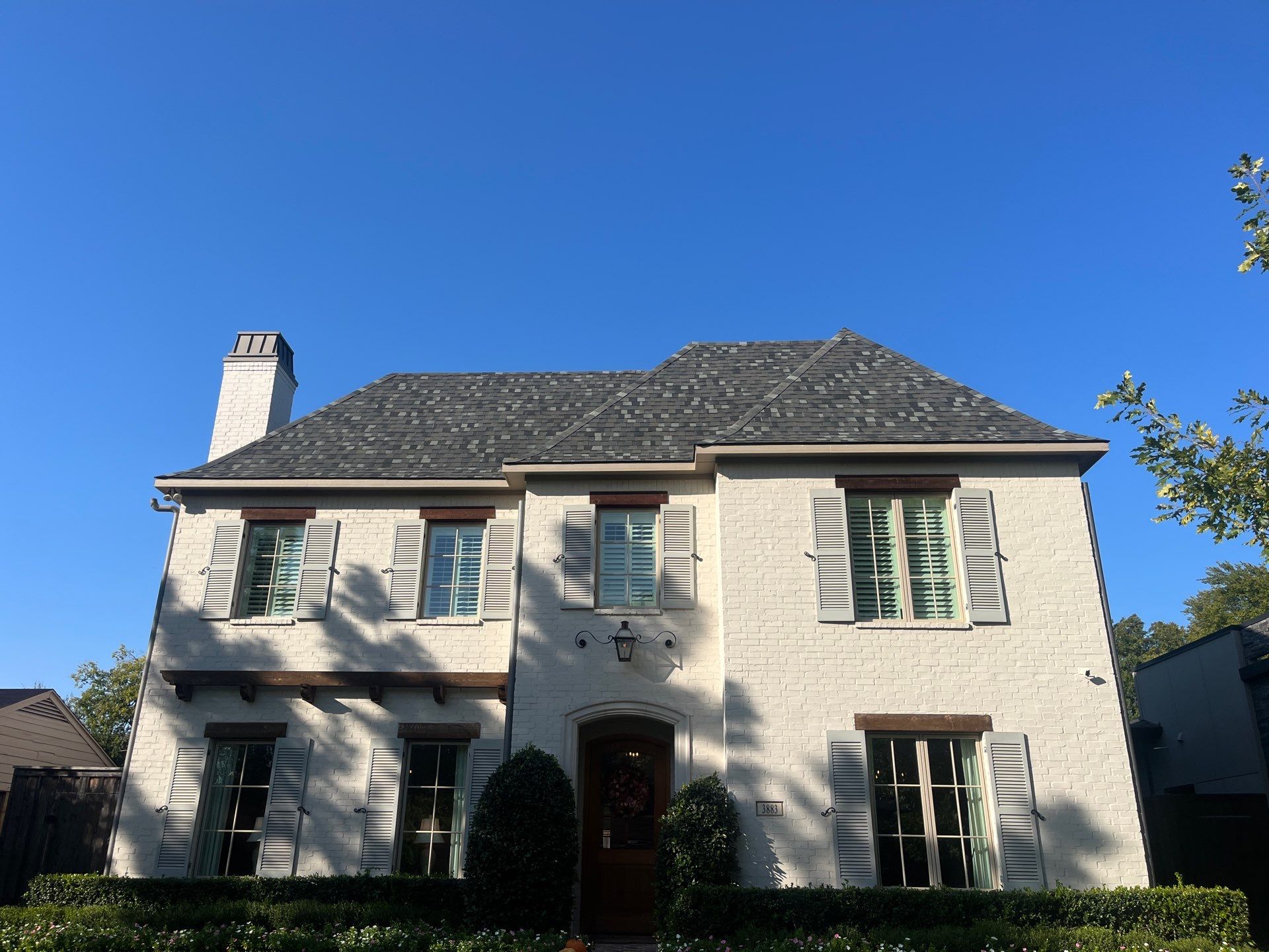 TAMKO Thunderstorm Grey-White Brick  by Tejas Roofworks + Restoration