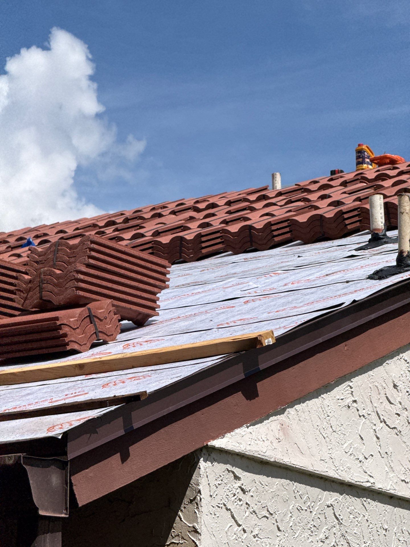Residential Tile Roof Replacement and Gutter Installation in Winter Park by Pinnacle Roofing Group