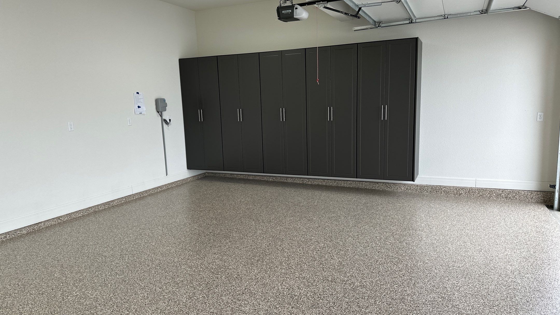 Ron B. upgraded his garage with cabinets and a Banner Garage Floor by Banner Garage