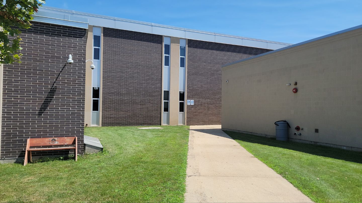 commercial pressure washing using Algaecide, soft wash soap by Northern Power Washing LLC.