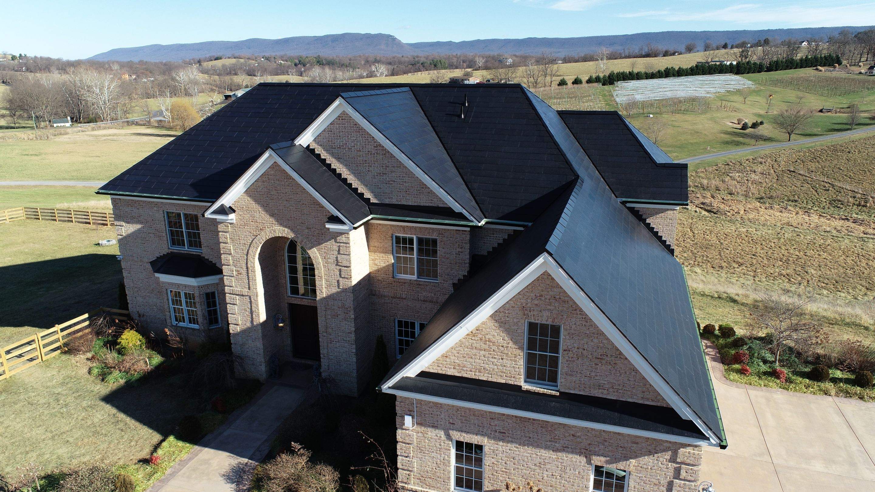 Tesla Solar Roof Replacement  by American Home Contractors
