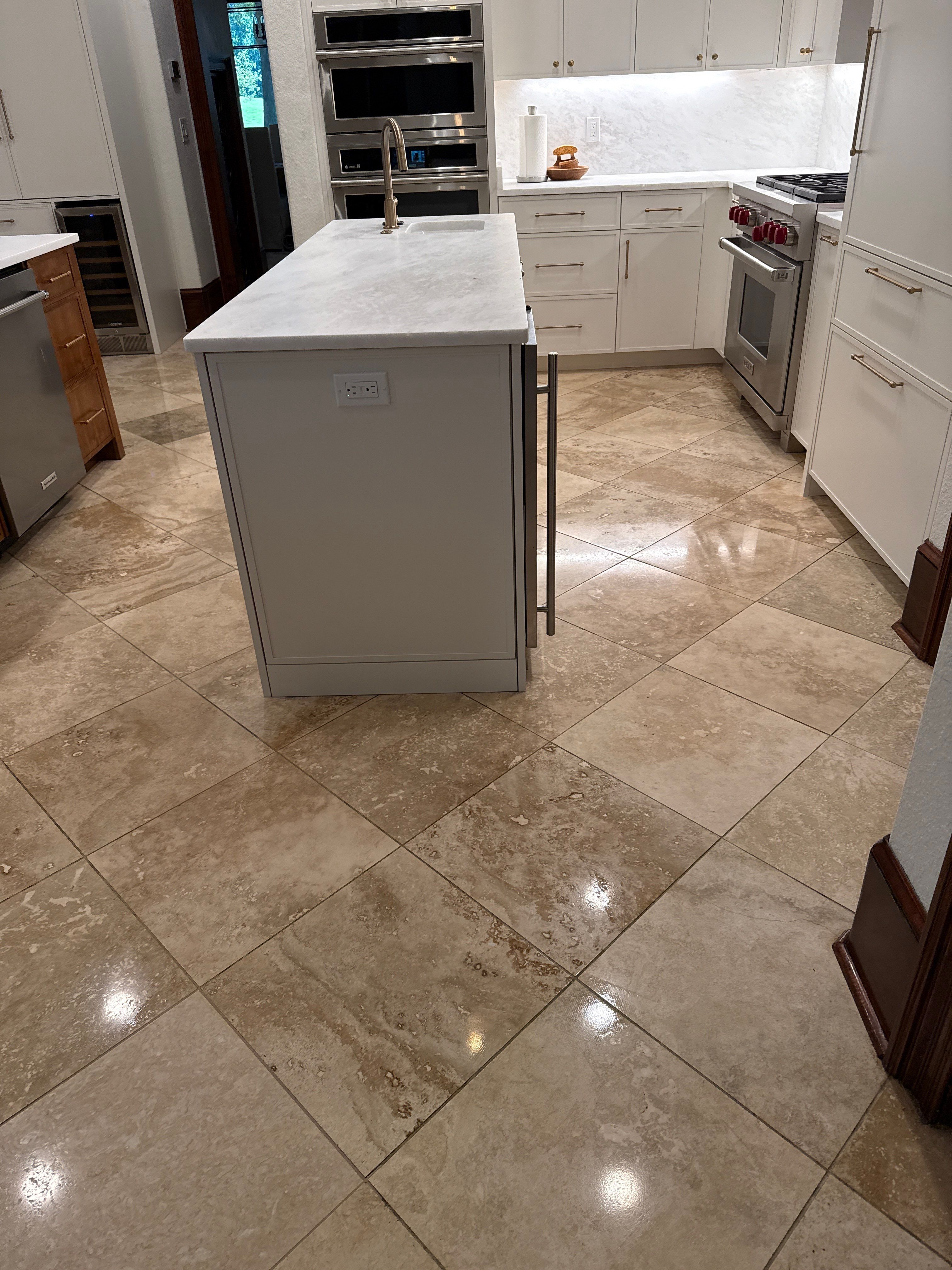Polished Travertine Floor Restoration for Gulf Shores Residence by Cornerstone Hard Surface Restoration