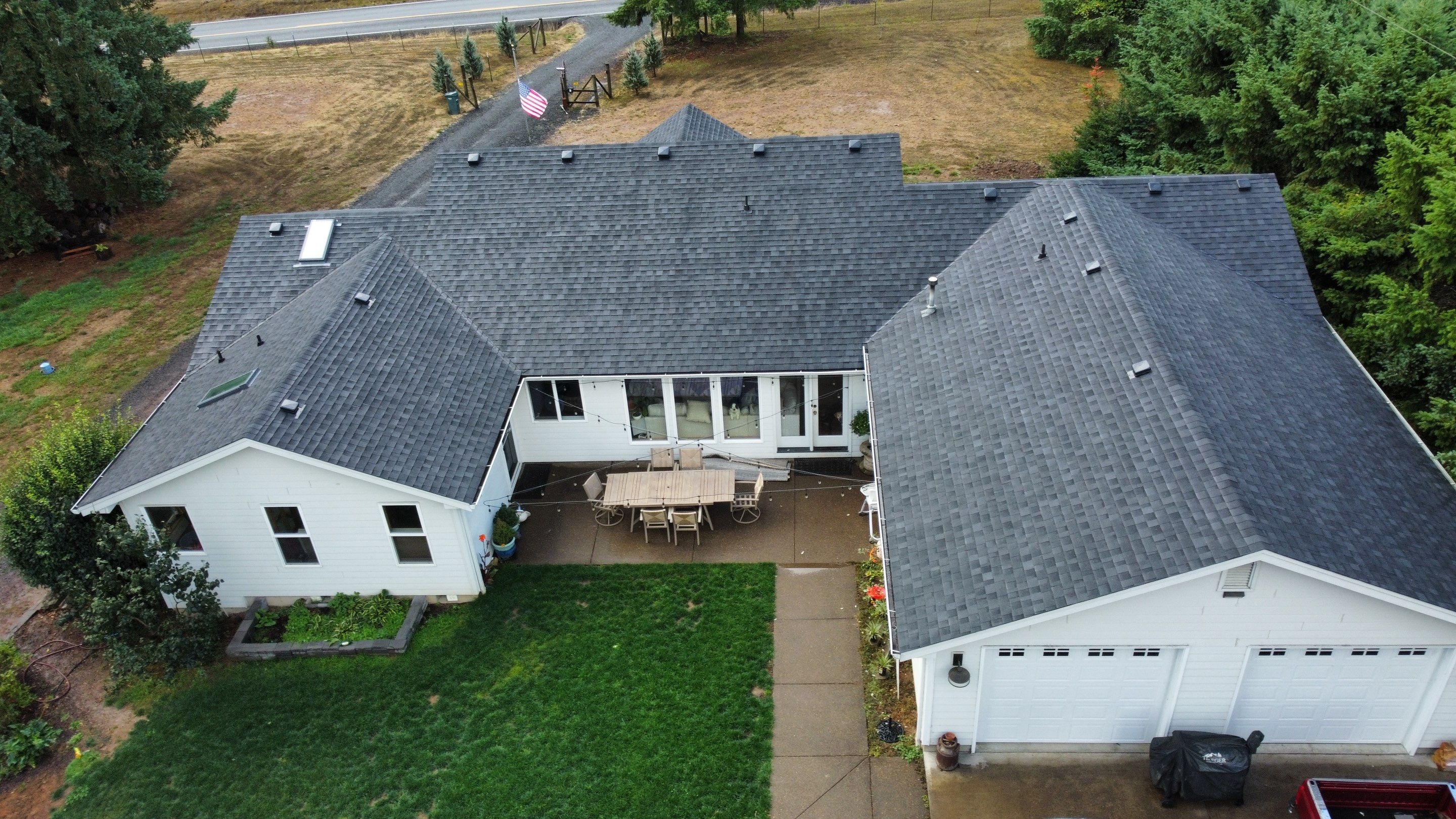 Residential Roofing Installation using IKO Dynasty (Color: Granite Black) by Orezona Building & Roofing Company, Inc.