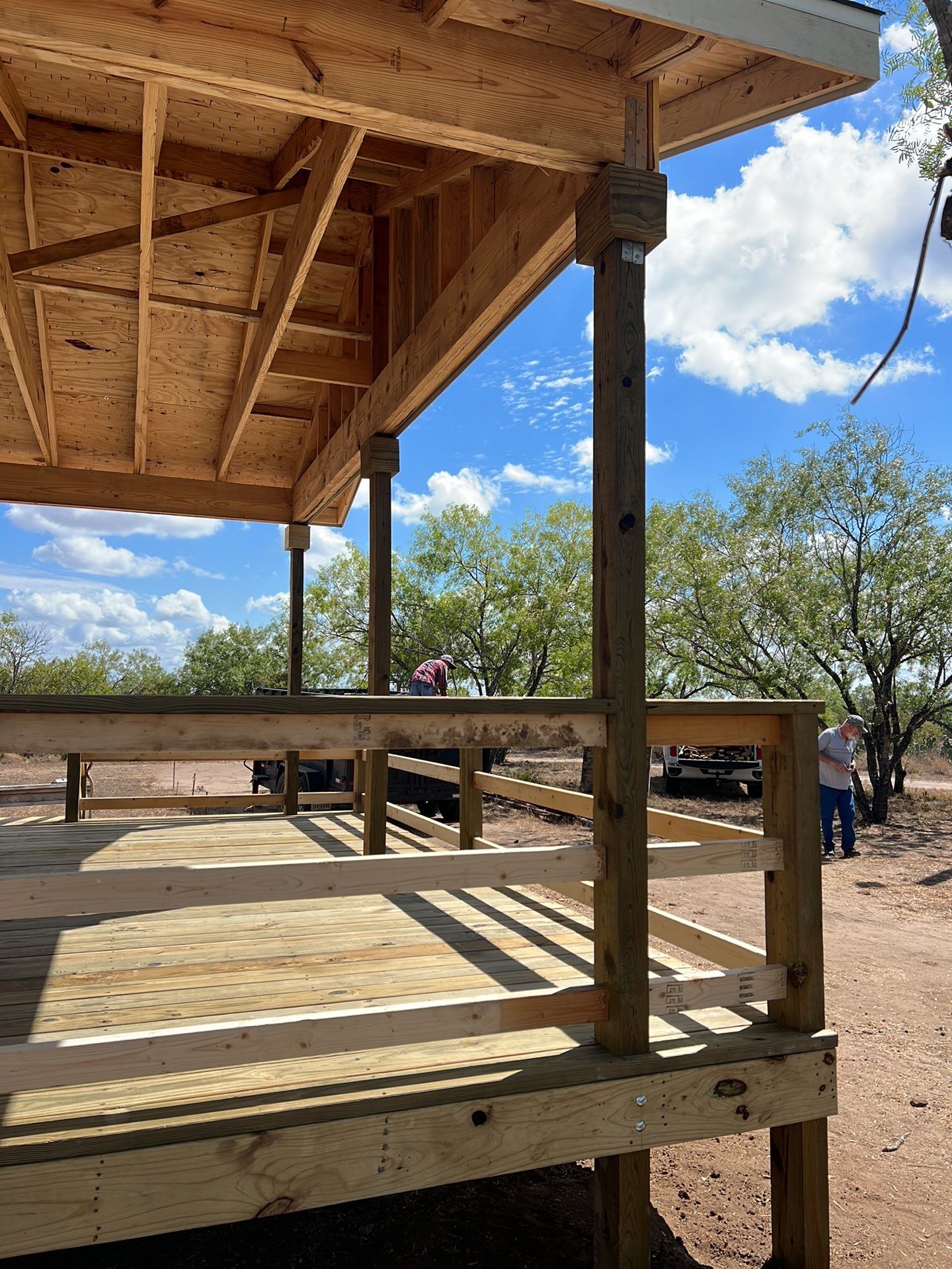 Front Porch Sitt'n by Bayfront Roofing and Construction
