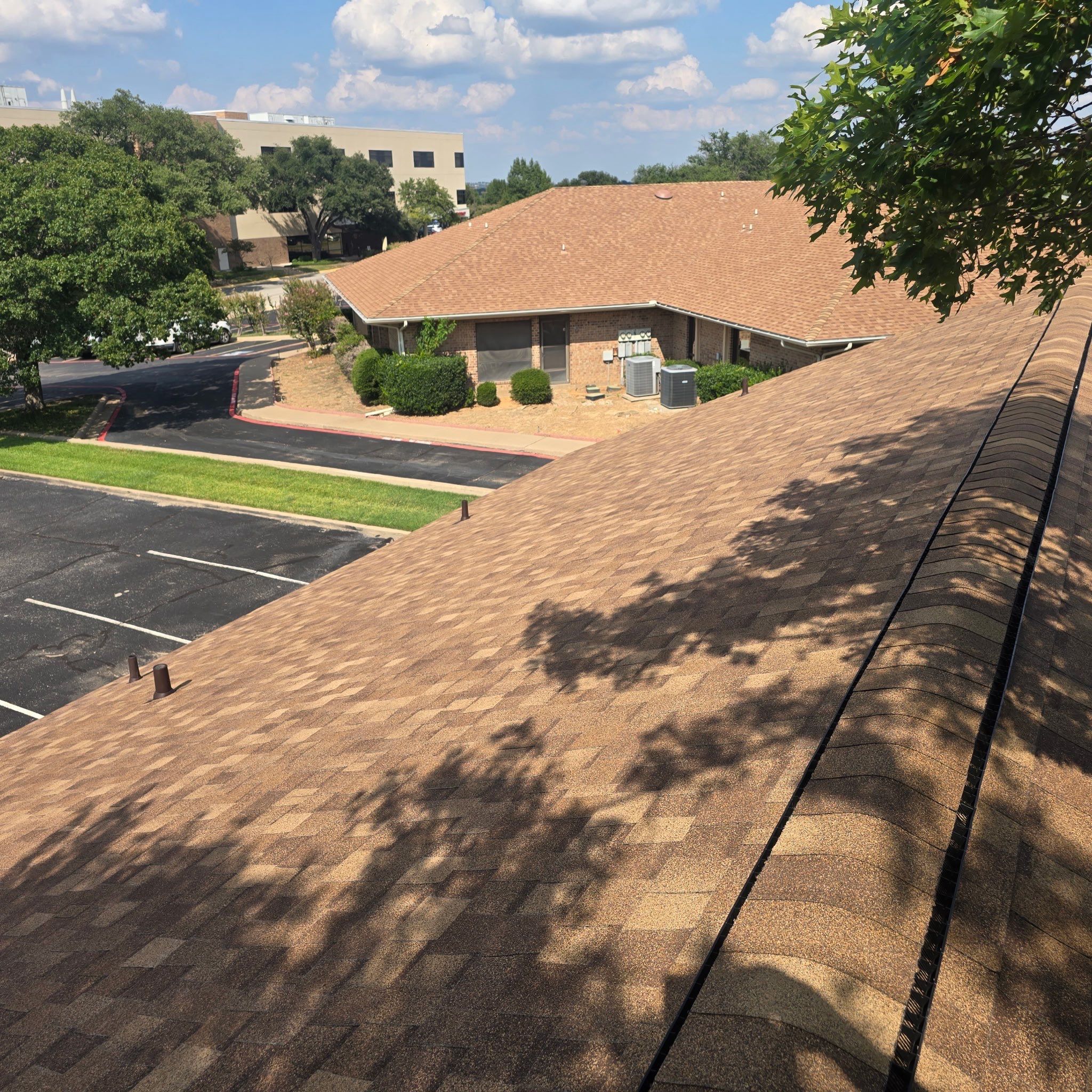 Commercial Roof Replacement using ATLAS StormMaster Shake by Harvey Roofing & Construction