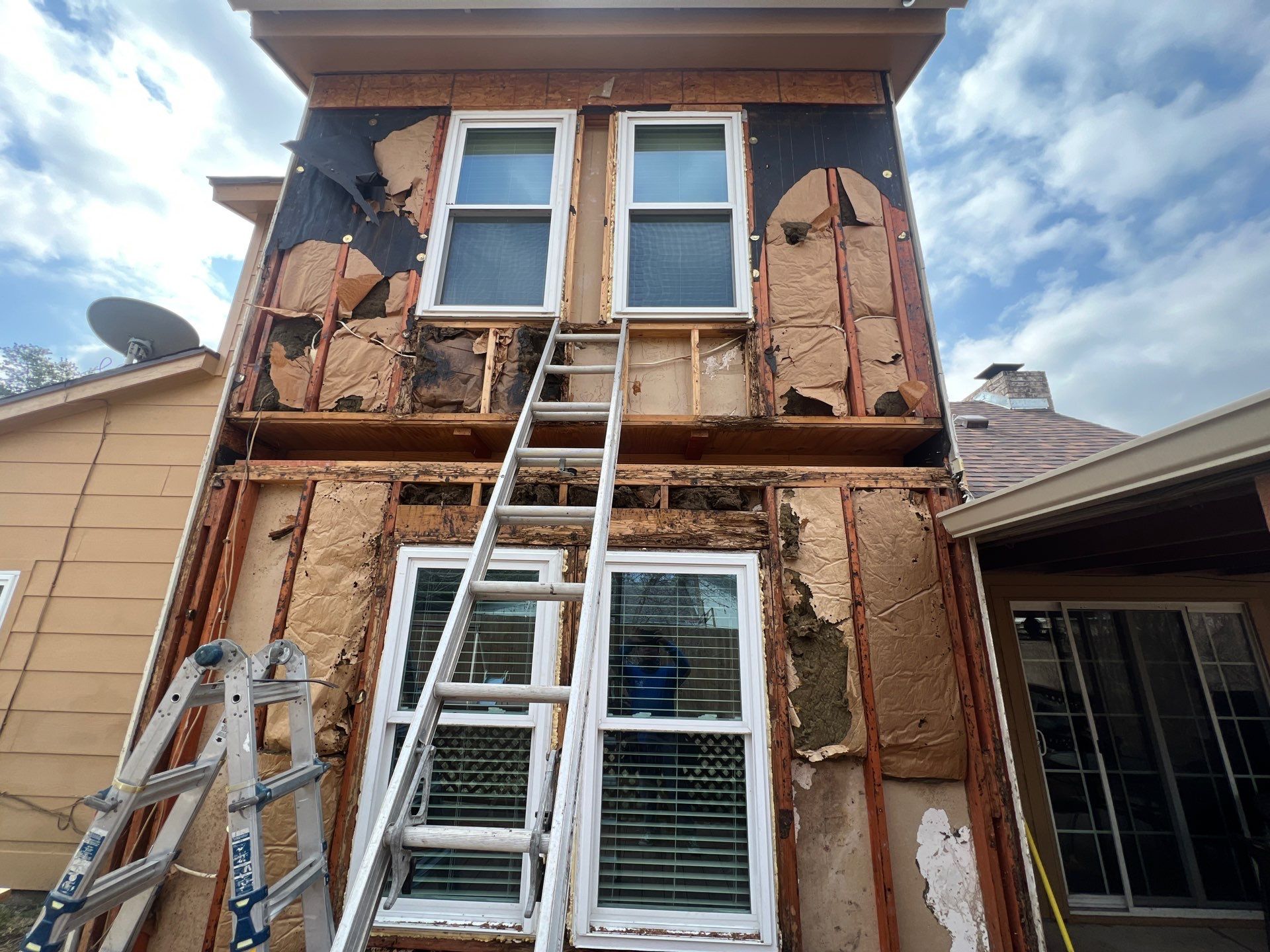 Installing Windows on a Submarine  by Bayfront Roofing and Construction