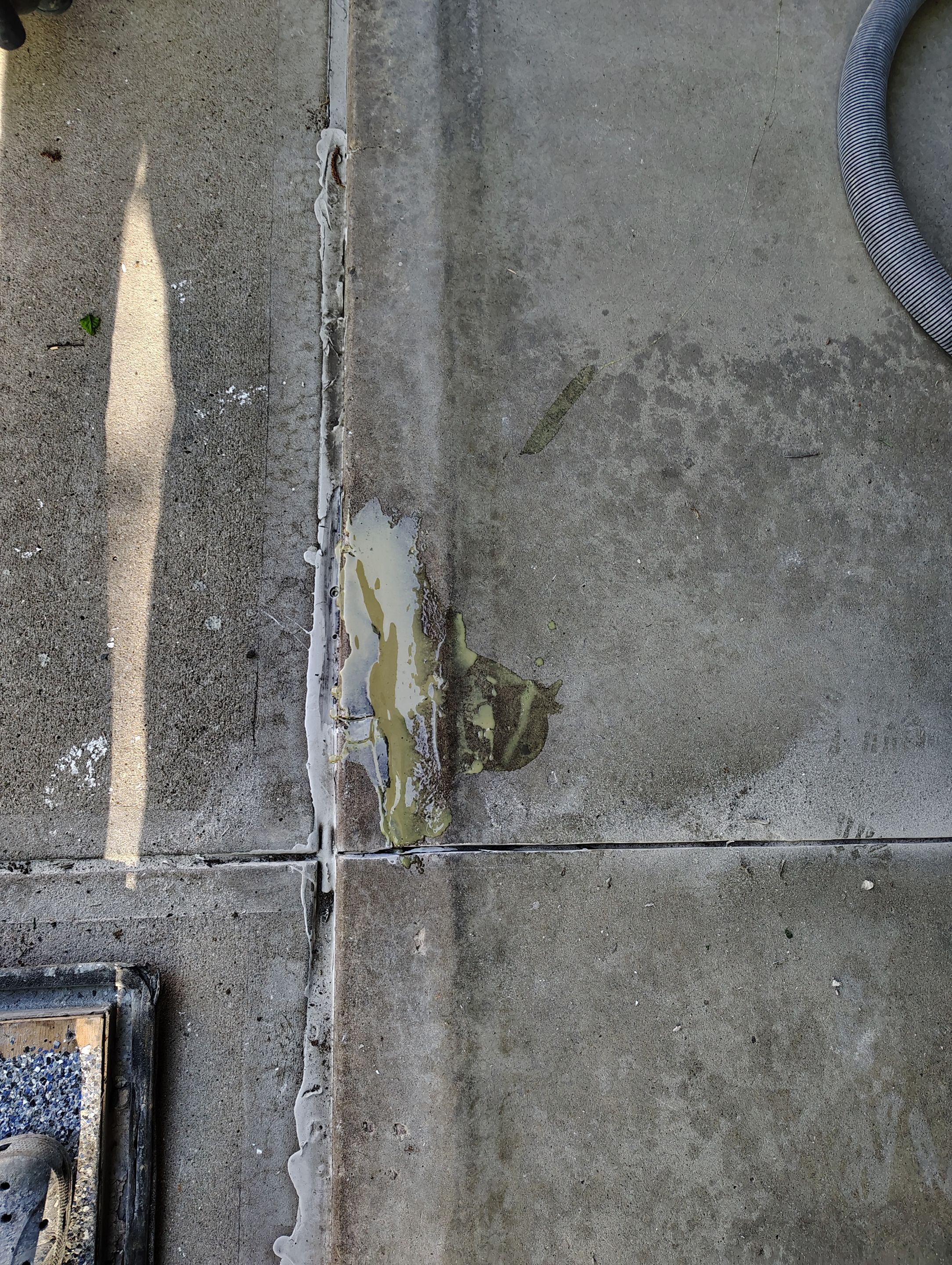 Sioux Falls Garage Concrete Repair and Epoxy Flake Floor Coating by Select Painting, Coatings & Garage Cabinets