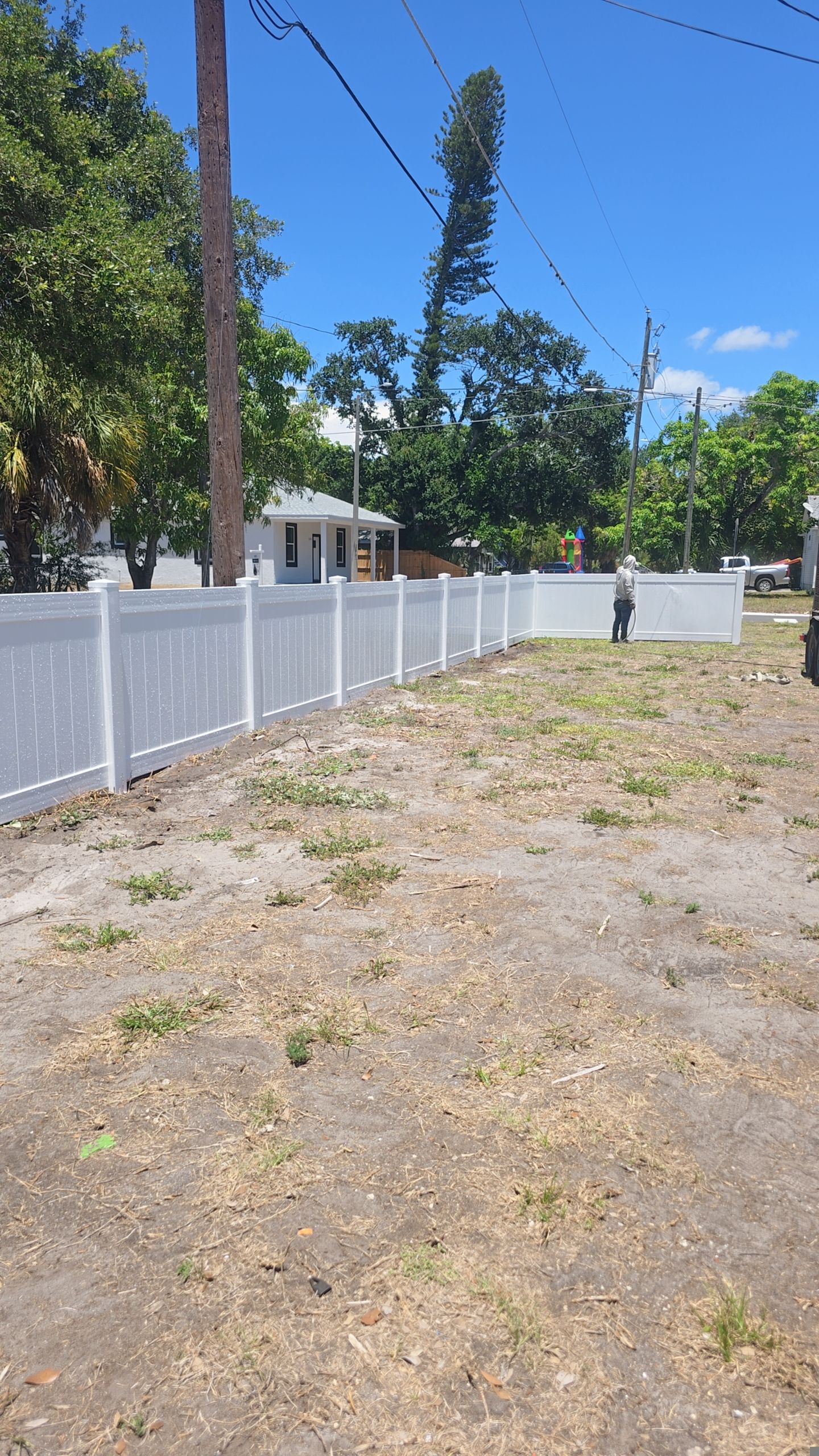 White Vinyl Privacy Fence and Gate Installation in Bradenton by True Fence LLC
