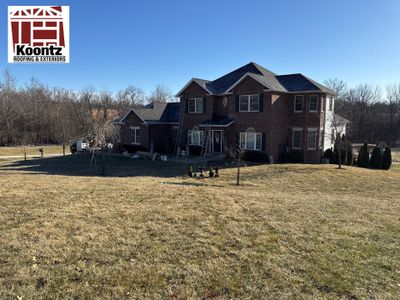 Residential Roofing Installation using Malarkey Vista AR Shingles (Black Oak)