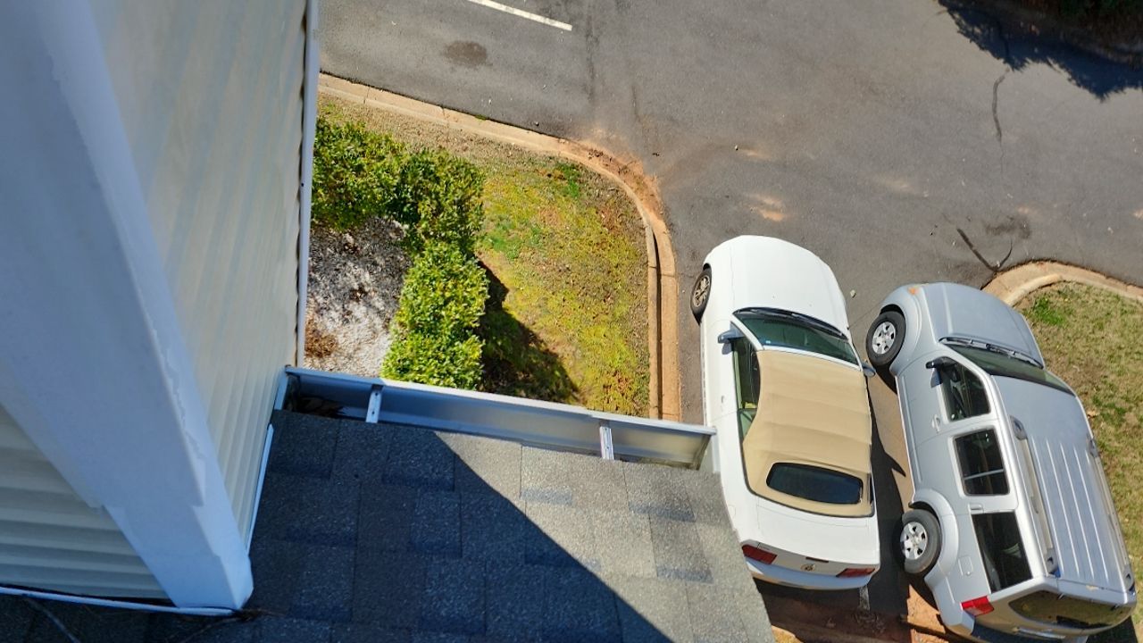 Gutter Cleaning using water by Power Wash Masters LLC